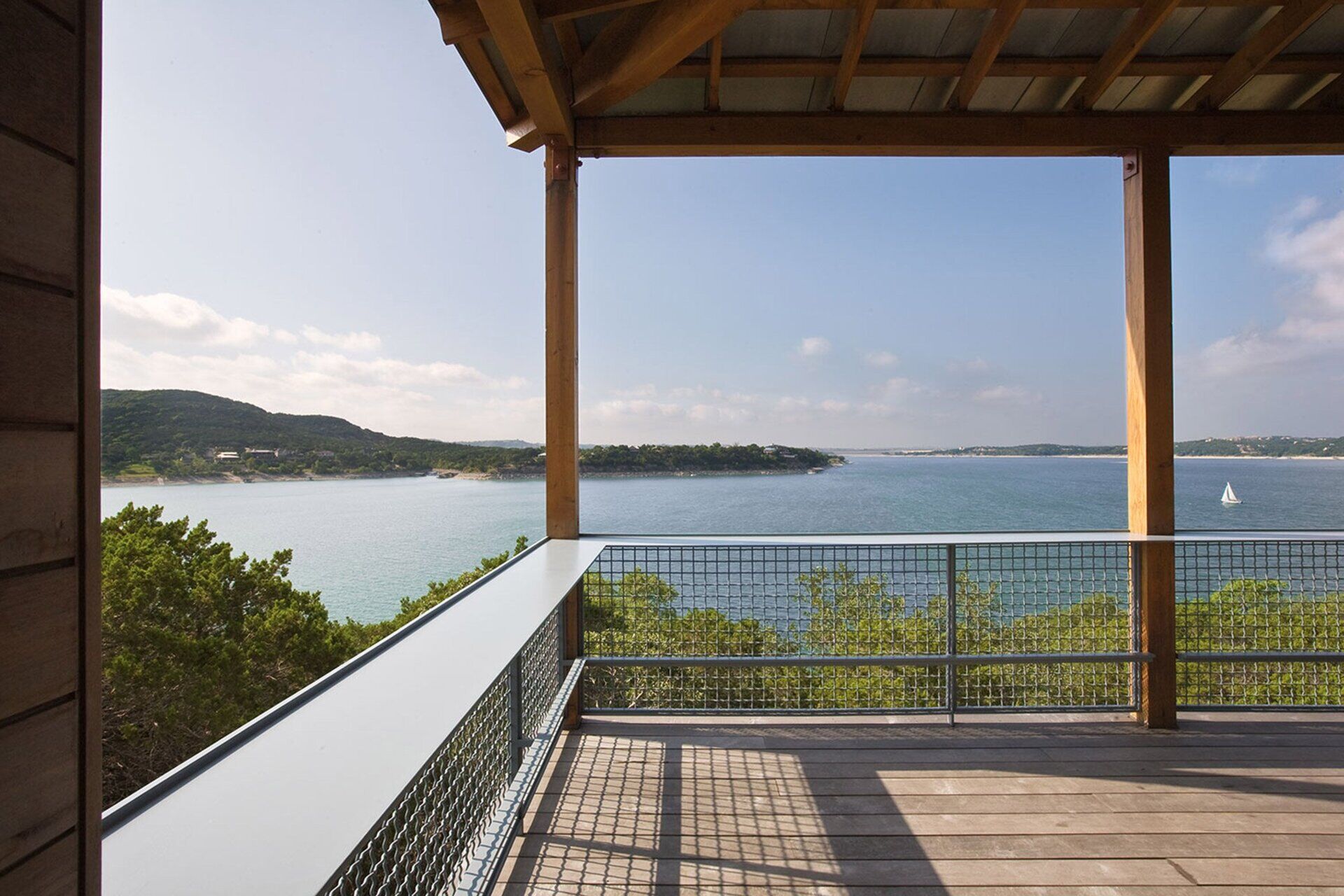 Perched above the treetops, the Tower House terrace captures the best views of Lake Travis and the Texas sky.