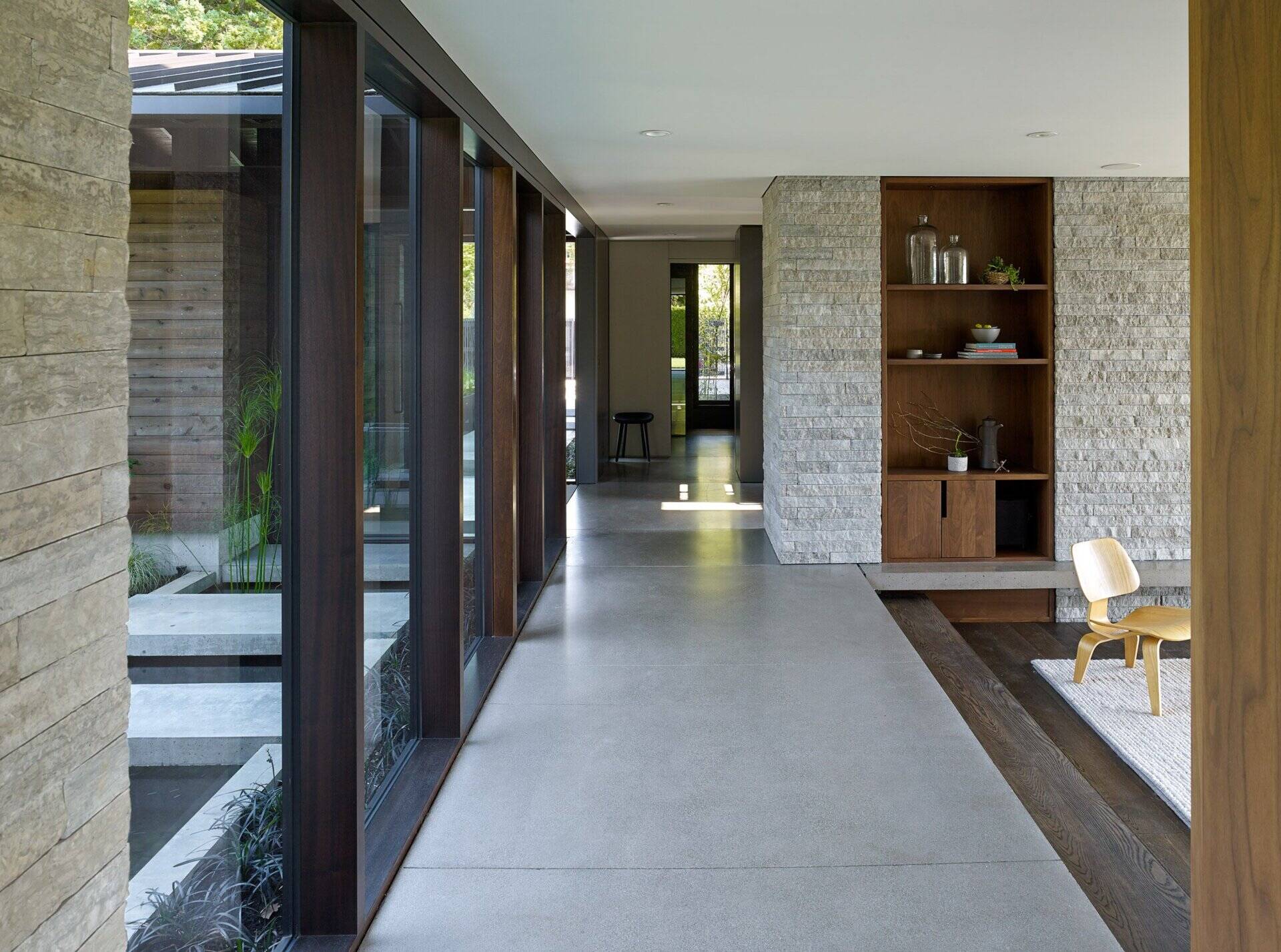 Polished heated concrete floors run throughout, adding warmth and continuity underfoot.