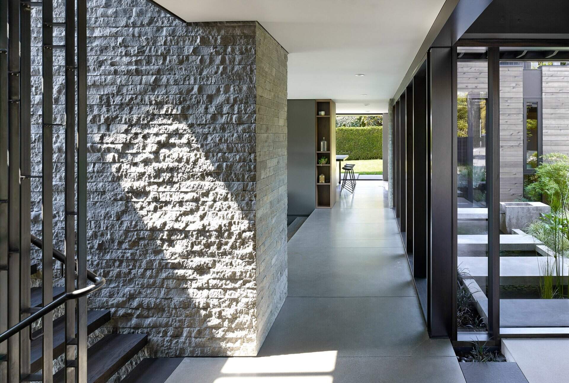 Polished heated concrete floors run throughout, adding warmth and continuity underfoot.