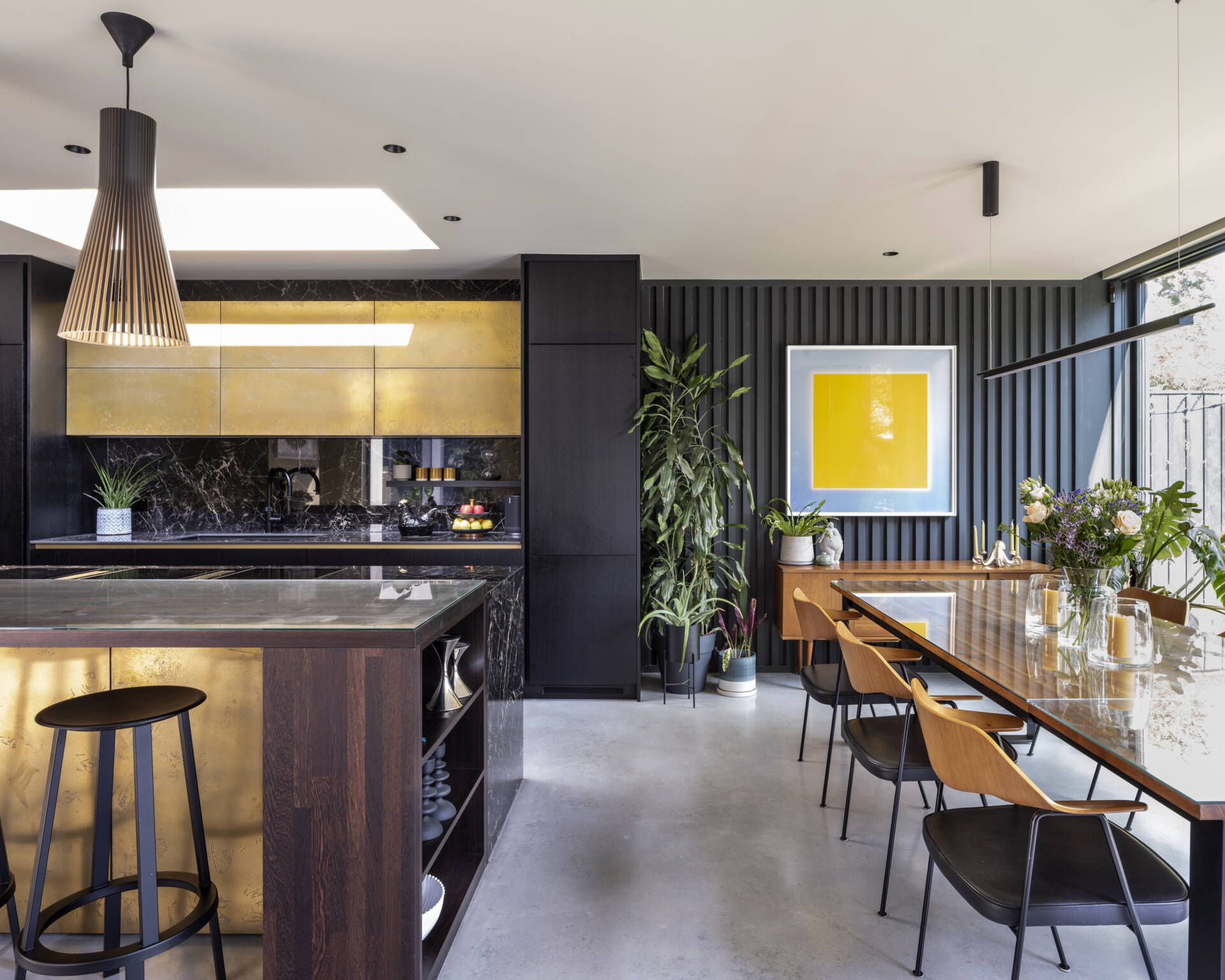 A spacious dining and kitchen area that’s built for entertaining—simple, warm, and beautifully connected to the outdoors.
