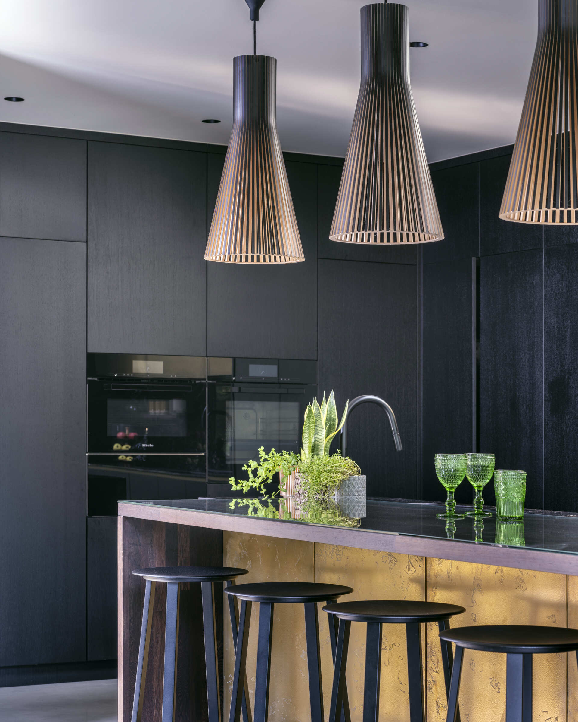 A spacious dining and kitchen area that’s built for entertaining—simple, warm, and beautifully connected to the outdoors.