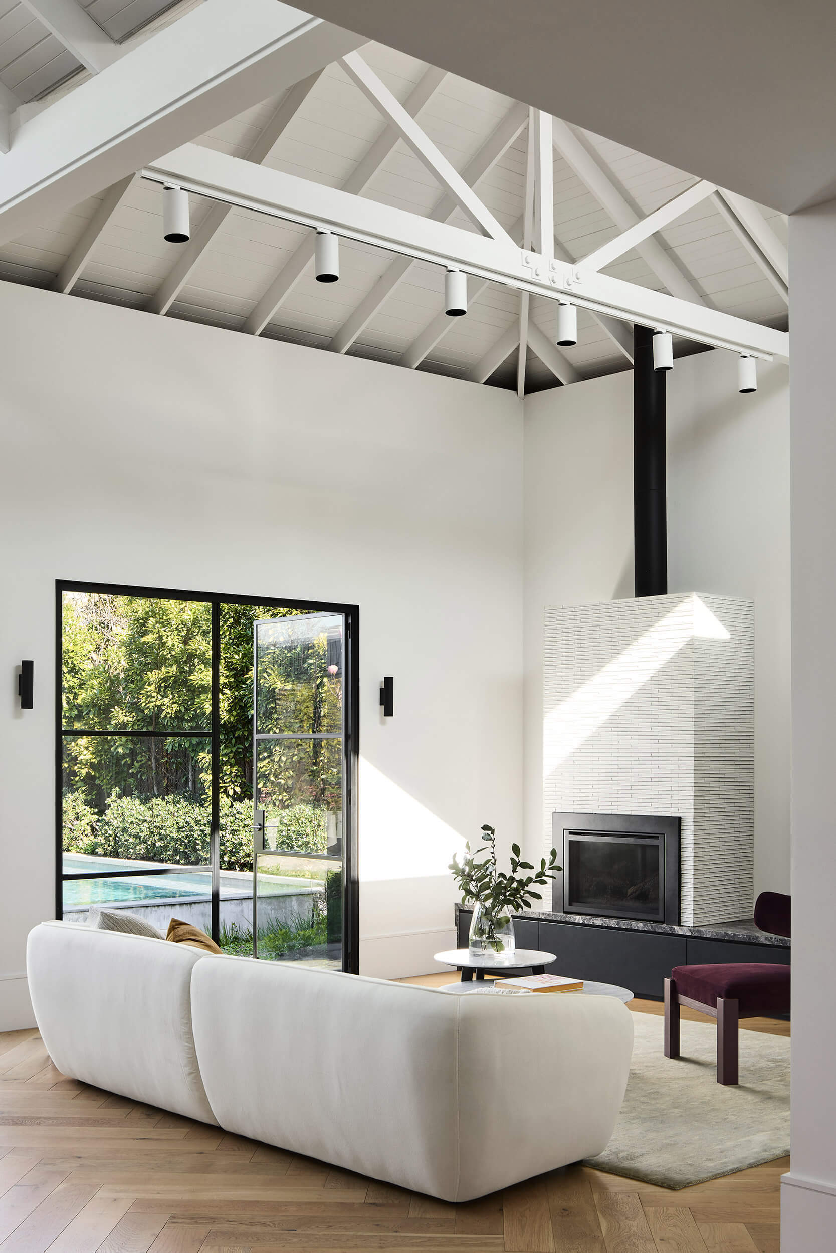 Open-plan living and dining bring warmth and refinement to this Australian family home.