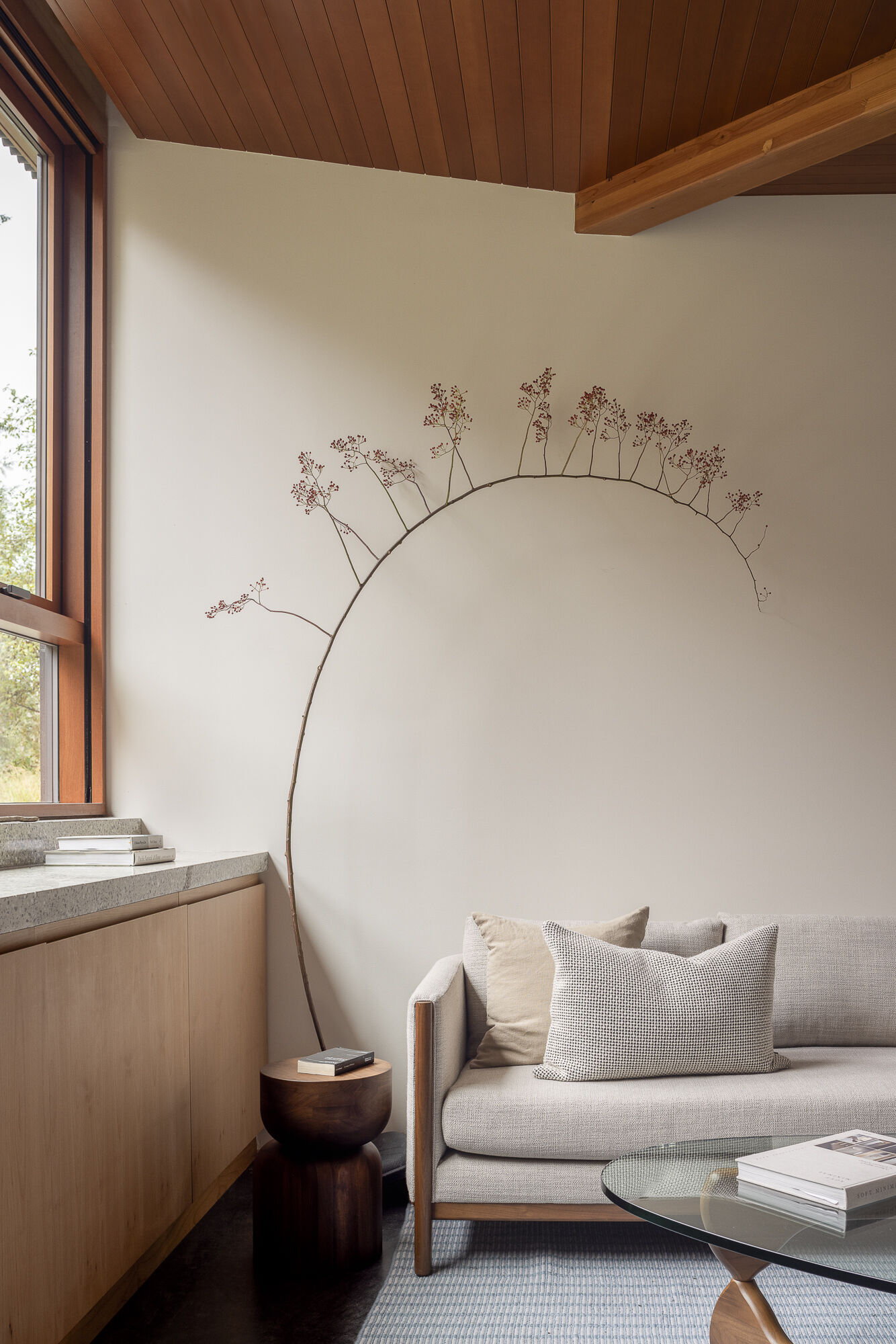 Inside, natural materials and handmade details tell a personal story. Locally sourced fir and cedar, terrazzo, and radiant concrete floors create a warm, practical backdrop for art, craft, and quiet reflection.