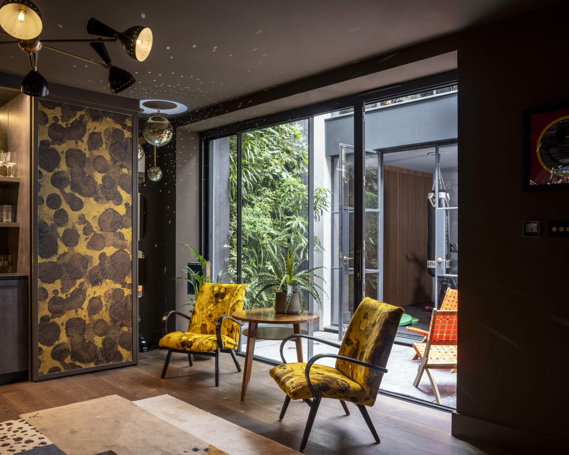 In the basement, the media and music rooms form part of a vibrant, multi-functional space. Designed for movies, gatherings, and creativity, this level demonstrates how practicality and personality can coexist.