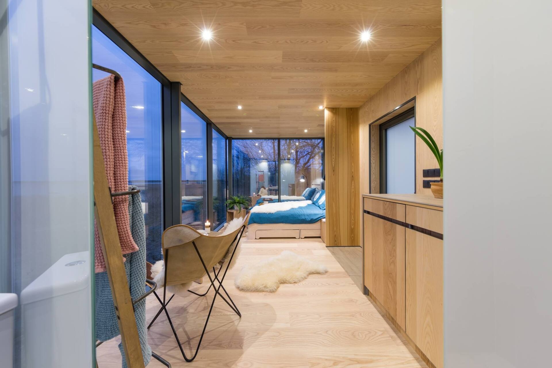 ÖÖD Houses are modular, prefabricated cabins blending Nordic design, mirrored glass, and clever interiors for compact, stylish living in nature.