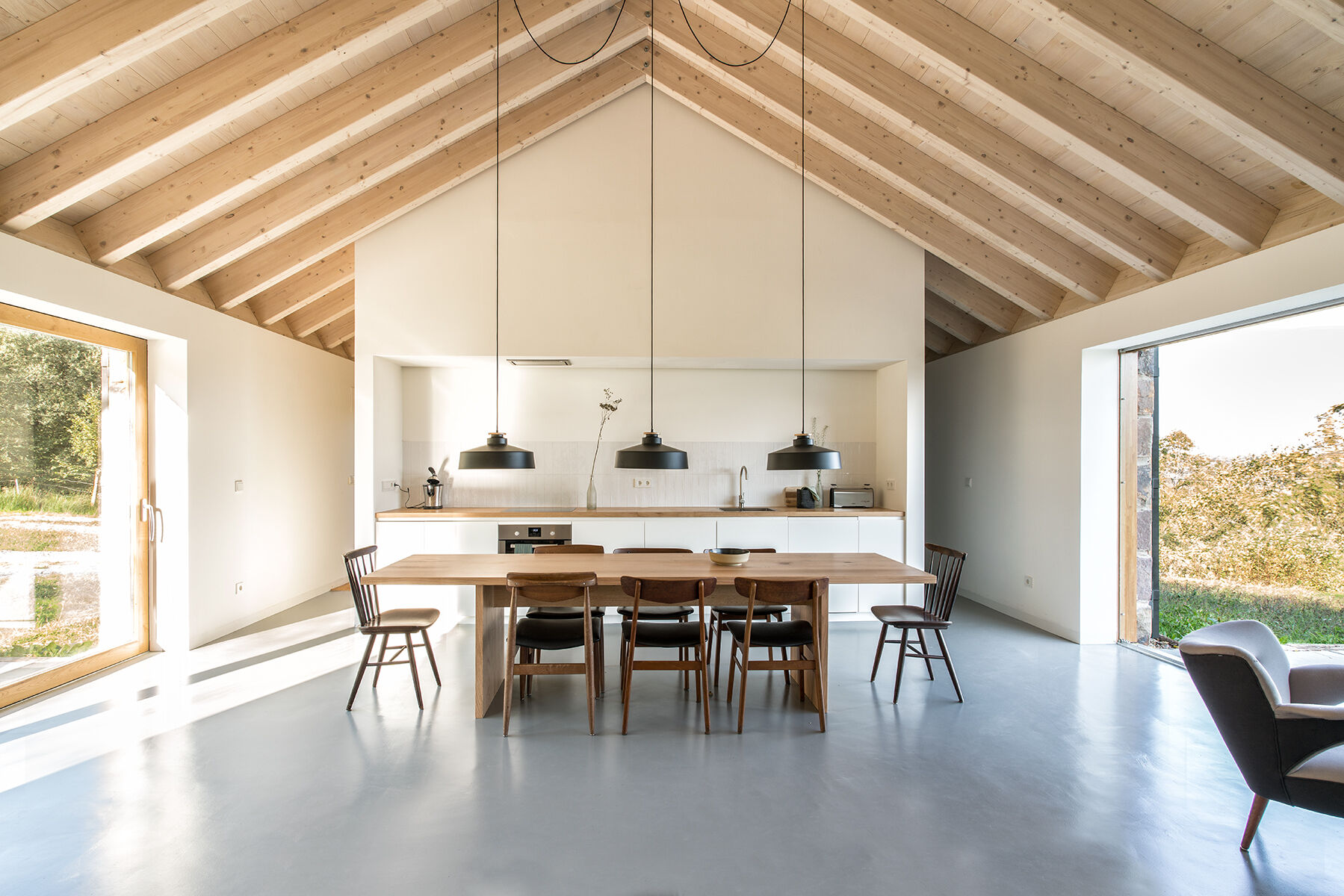 Warm wood, a fireplace, and minimalist decor make Villa Slow a place made for quiet moments.