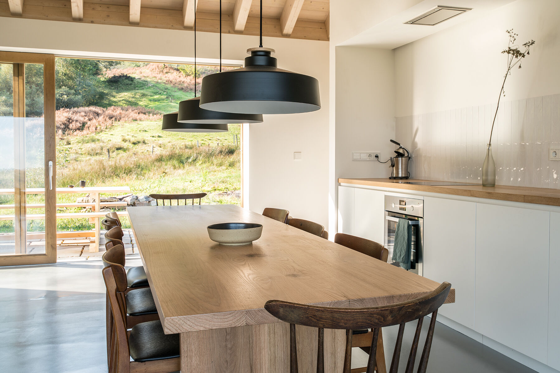 Warm wood, a fireplace, and minimalist decor make Villa Slow a place made for quiet moments.