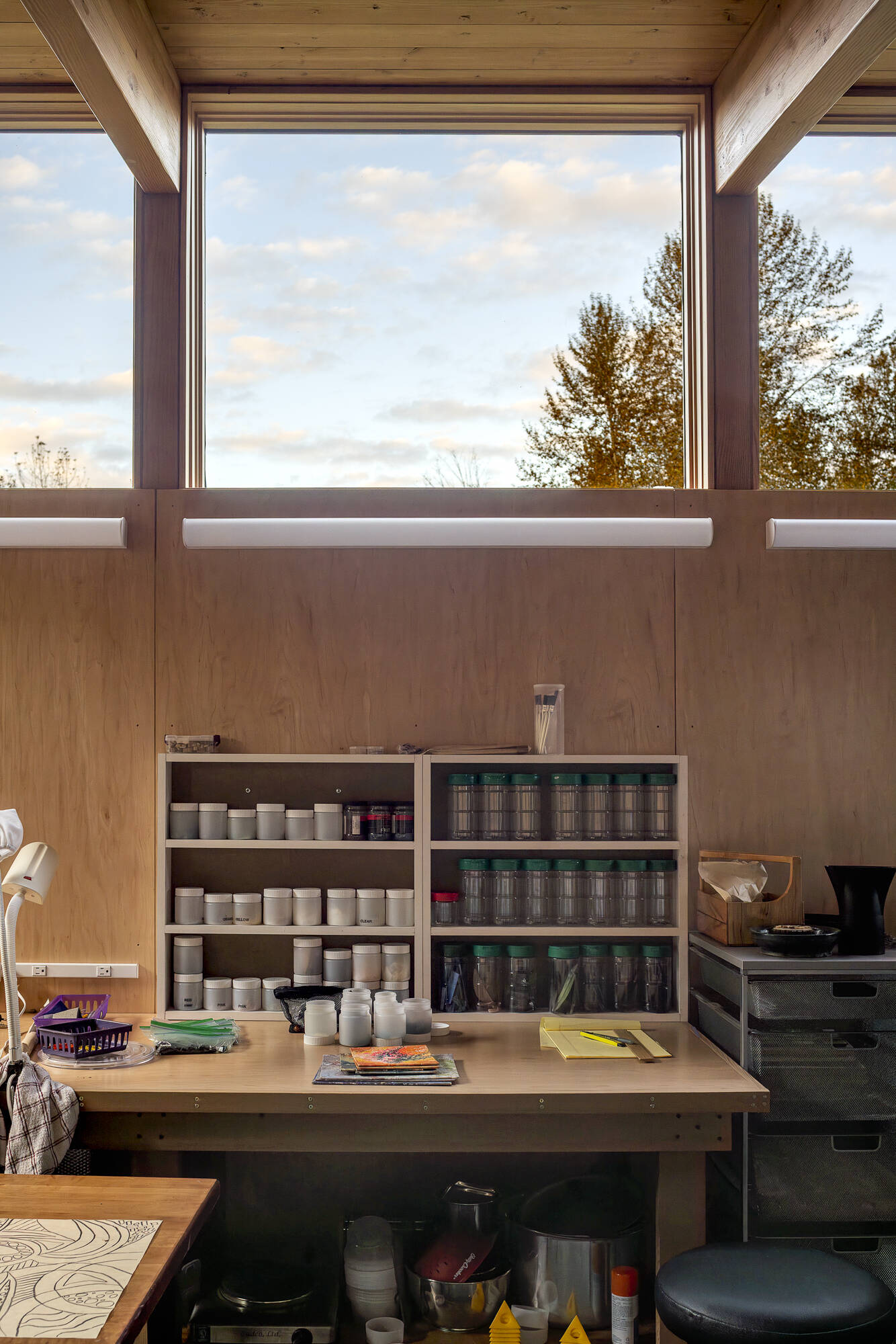 Linked by sheltered walkways, the woodworking and glass studios are flooded with north light from clerestory windows. Every workspace connects back to the garden courtyard, making creativity and craft a natural part of daily life.