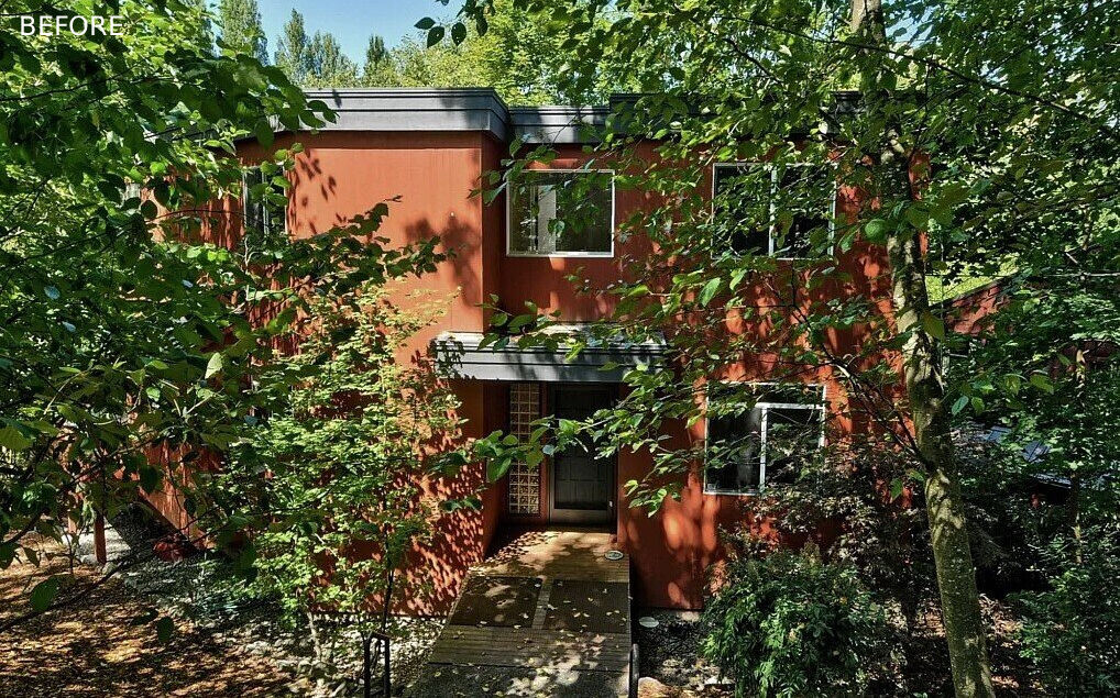 BEFORE - A winding path approaches from the east, weaving between alder trees before rising to an elevated deck that meets the front porch, where a soft yellow front door greets visitors. Natural light filters through dense greenery to the south, creating a soft welcome as you enter.