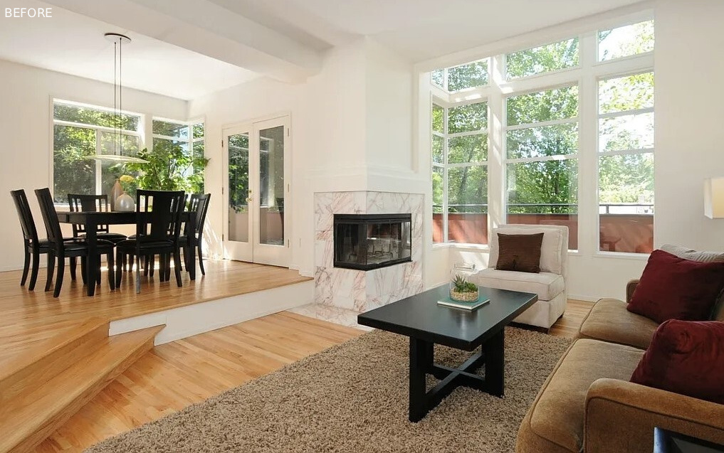 BEFORE - In the living room, custom ash built ins unify the updated interiors. La Cantina sliders and folding doors open wide, pulling western light into the living spaces and connecting the interior to the rebuilt deck. A blackened steel surround frames the Stuv 16 stove, giving the room a grounded focal point without overwhelming the calm material palette.