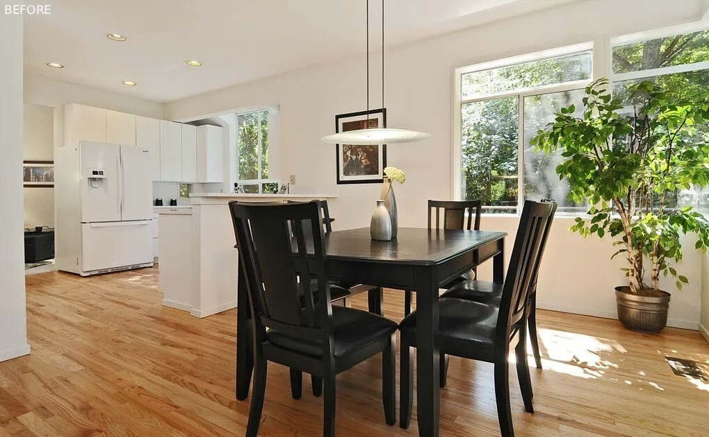 BEFORE - The dining zone sits open to the living spaces, benefiting from the new flow created during the remodel. With light pouring in from multiple directions, it works as an everyday family hub.