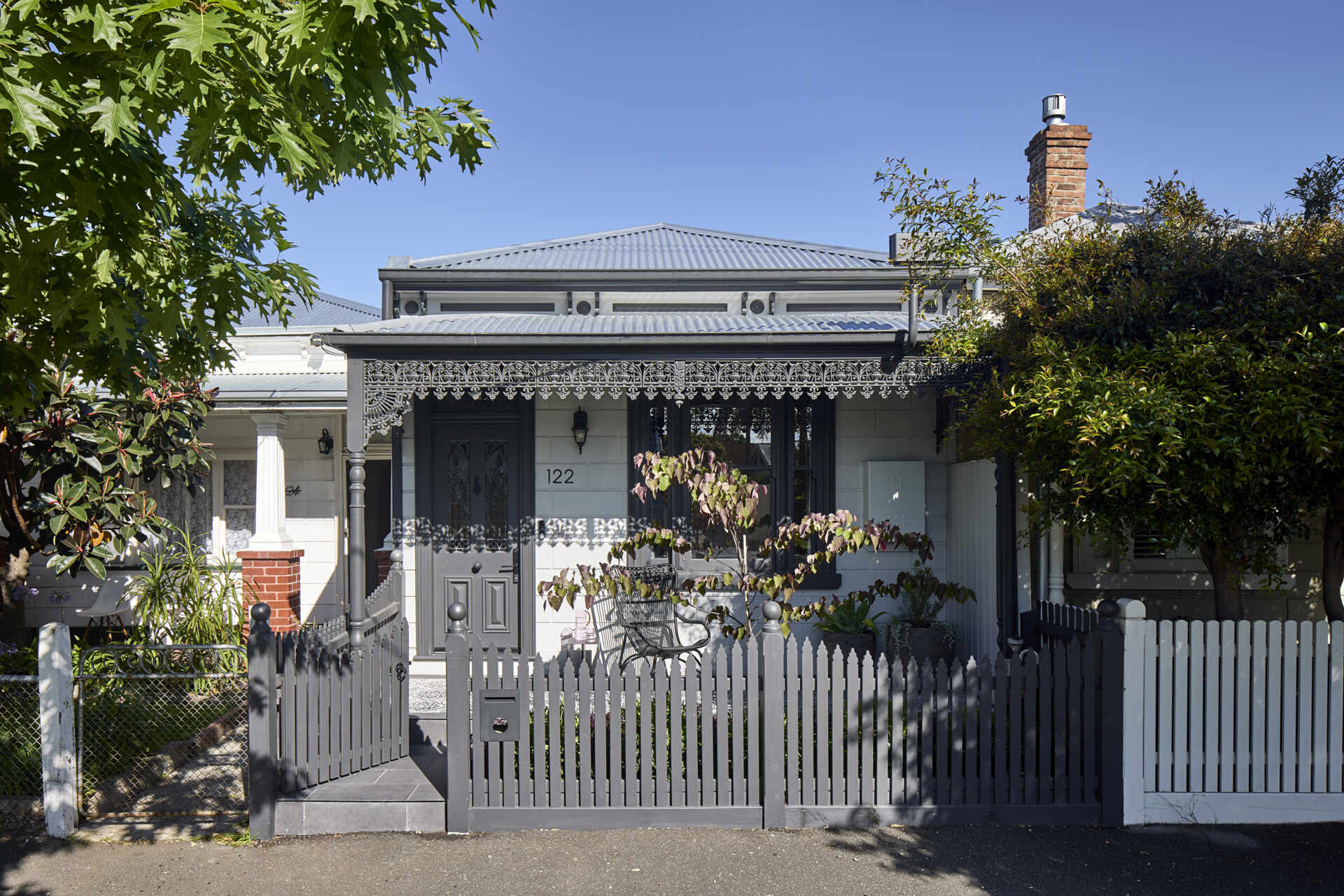 The original Australian workers cottage has been reimagined with a blend of heritage and contemporary materials.