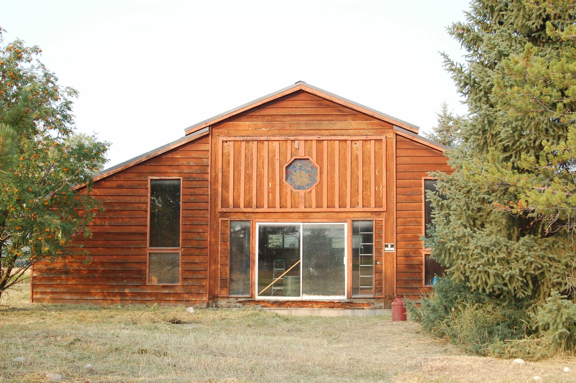 A once-dilapidated mountain cabin with charm and potential, sitting quietly on a three-acre property, waiting for a thoughtful transformation.