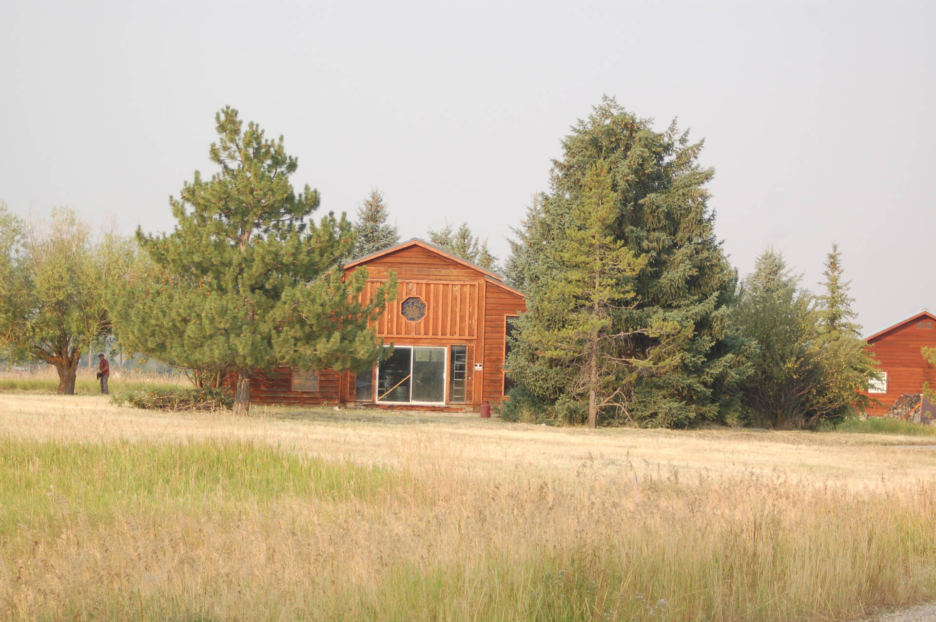A once-dilapidated mountain cabin with charm and potential, sitting quietly on a three-acre property, waiting for a thoughtful transformation.