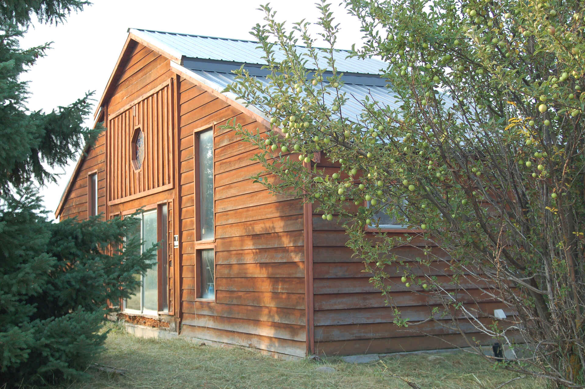 A once-dilapidated mountain cabin with charm and potential, sitting quietly on a three-acre property, waiting for a thoughtful transformation.