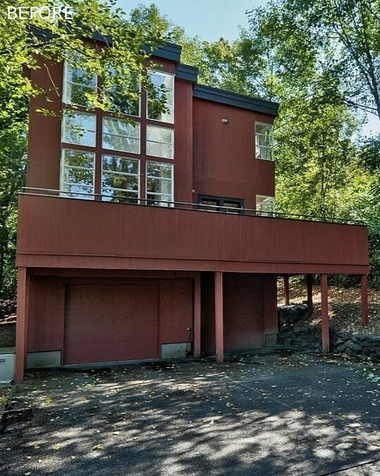 BEFORE - A calm modern update gives this Seattle home a stronger connection to its wooded surroundings with warm materials and Passive House thinking.
