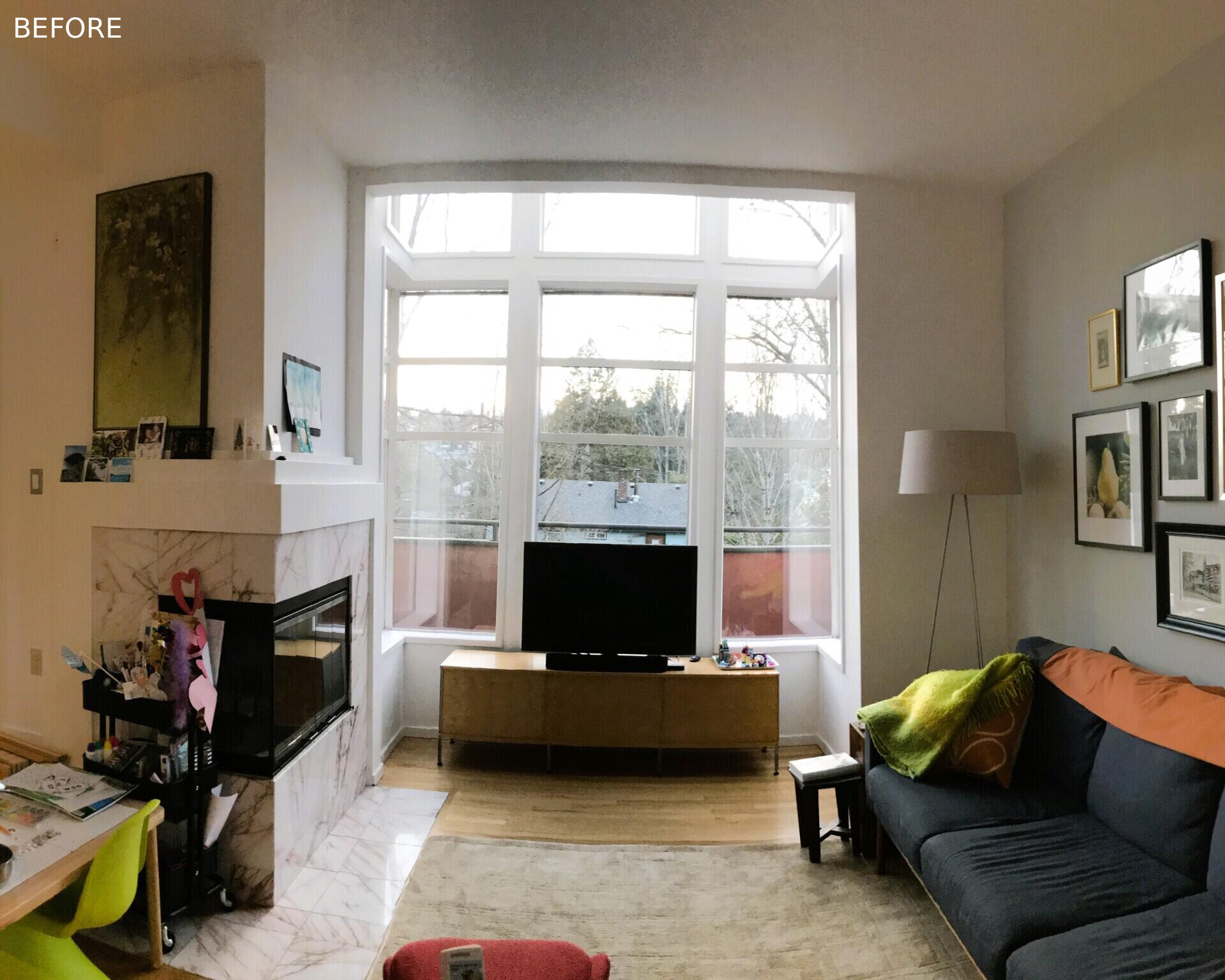 BEFORE - In the living room, custom ash built ins unify the updated interiors. La Cantina sliders and folding doors open wide, pulling western light into the living spaces and connecting the interior to the rebuilt deck. A blackened steel surround frames the Stuv 16 stove, giving the room a grounded focal point without overwhelming the calm material palette.