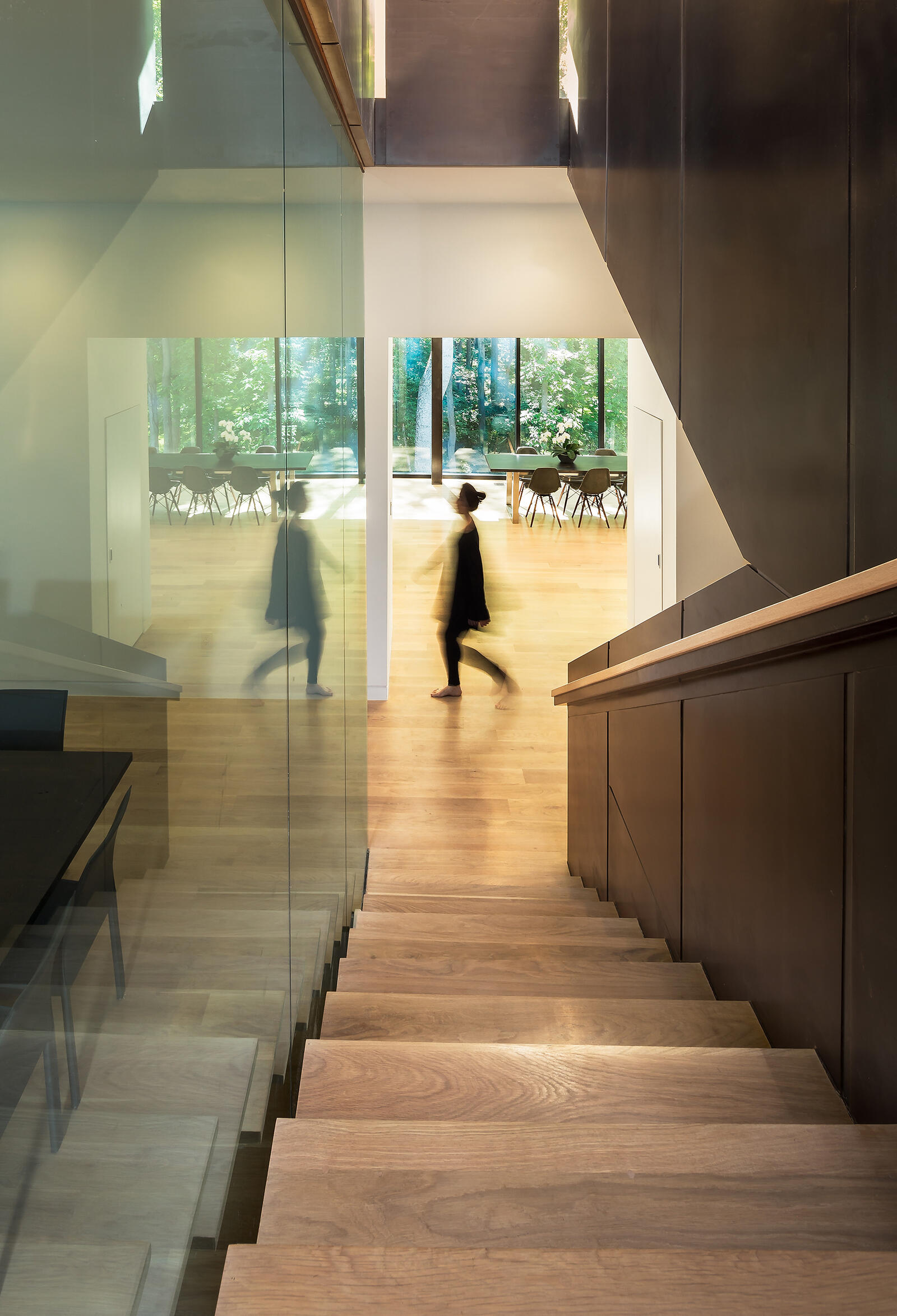 A staircase crafted from wood and hot-rolled steel ties the home together, both structurally and visually.