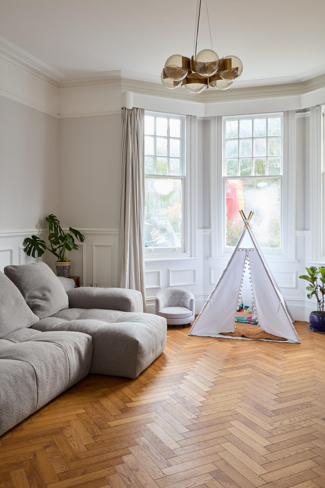 The open-plan living space at Perry Vale House celebrates light, air, and togetherness. Designed by Wellstudio Architecture, it transforms a once-dark Edwardian layout into a connected family home that feels both timeless and contemporary.
