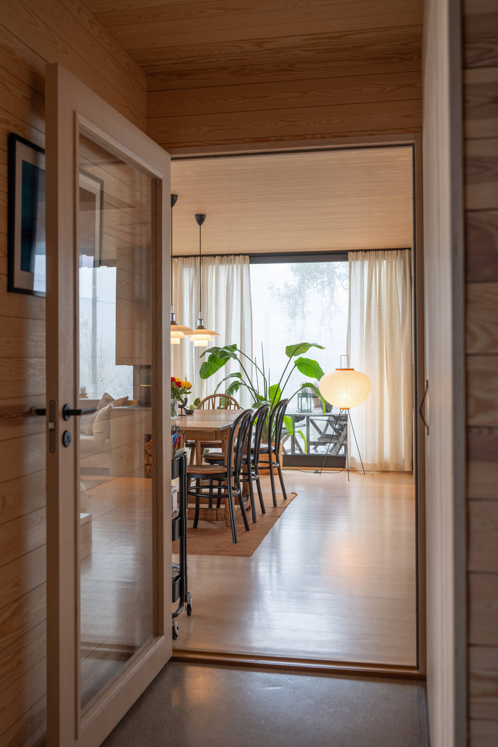 A lowered foundation and thoughtful entryway create smooth access while balancing practicality with warmth and welcome.