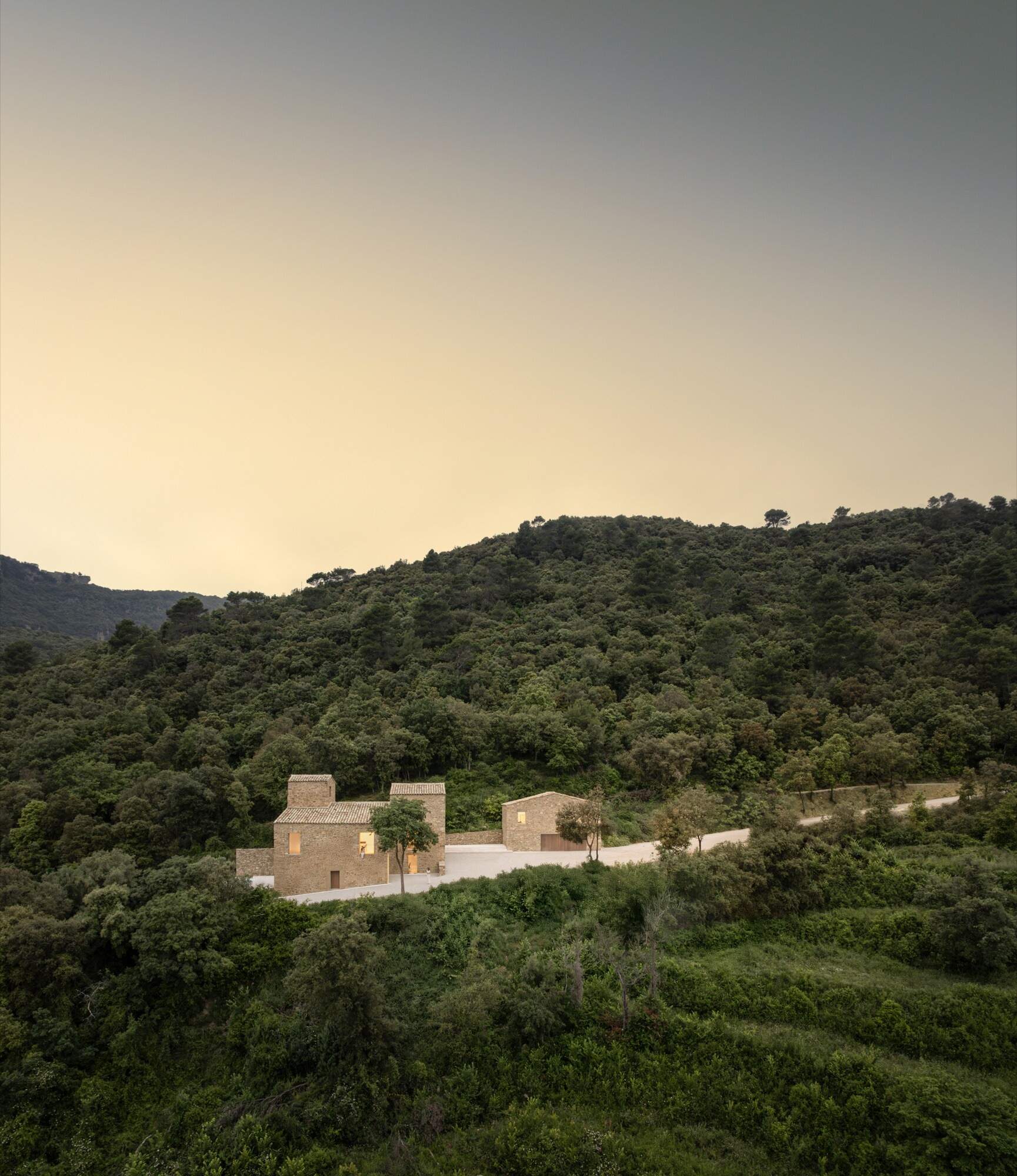A masterful balance of old stone and modern precision, Mas Cadalt’s architecture preserves its Catalan farmhouse soul while embracing contemporary clarity and light.