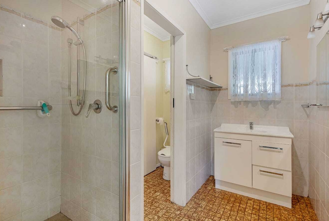 BEFORE THE RENOVATION - An untouched 1960s home that once felt dark and closed off from its incredible mountain surroundings.