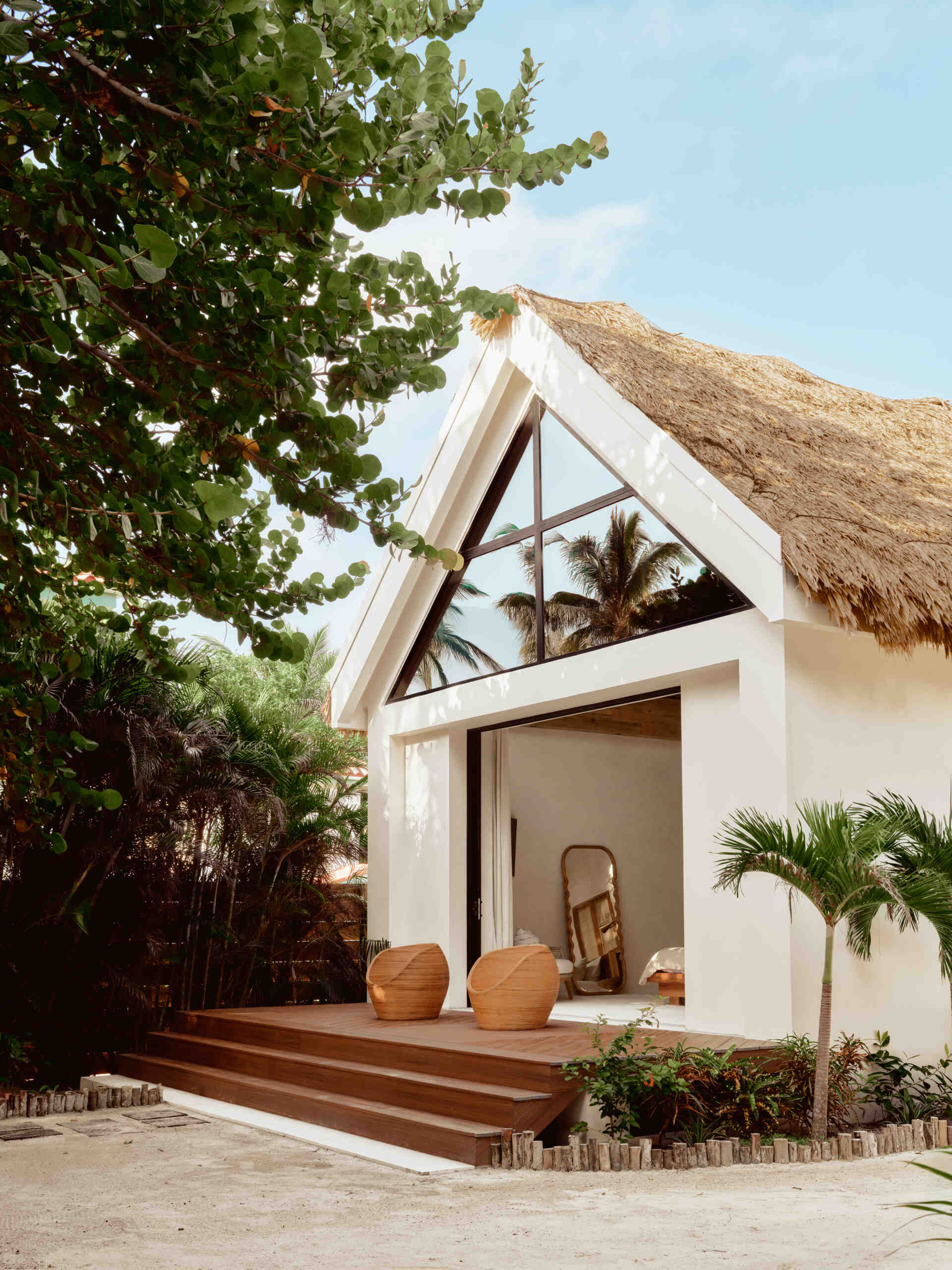 This island home has two guest casitas that allow friends and family to stay comfortably while maintaining privacy. Their placement supports the compound layout, with shared outdoor spaces acting as the social center. This arrangement makes long visits possible without crowding the main house.