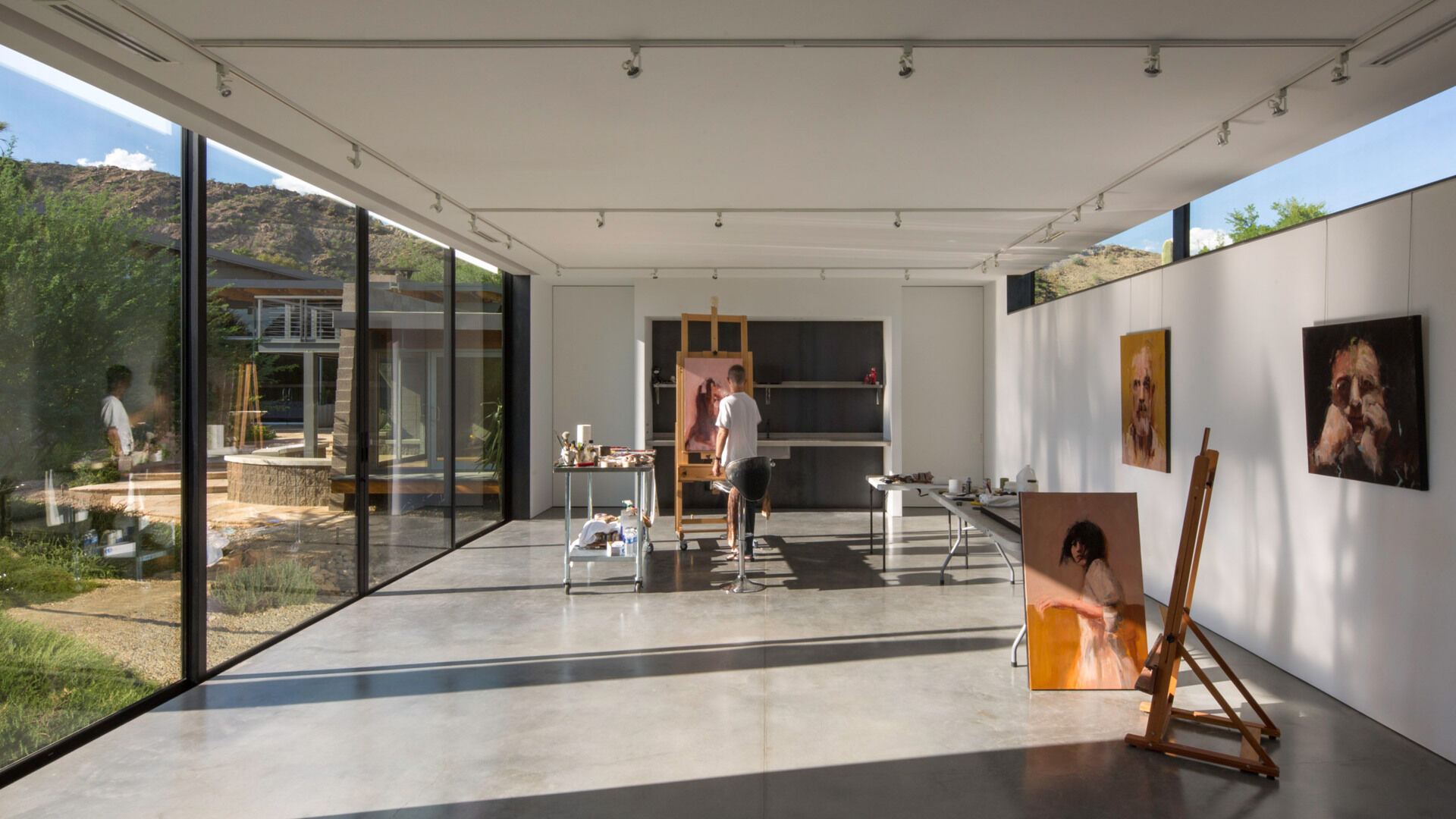 A flexible open plan interior allows this art studio to function as both a workspace and a gallery.