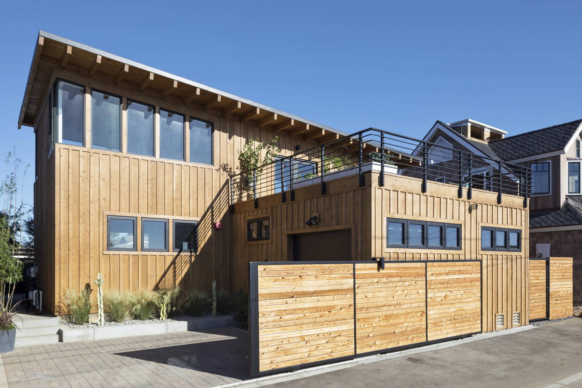 The garage roof doubles as a view deck, showing how every element of the home is designed to work efficiently.