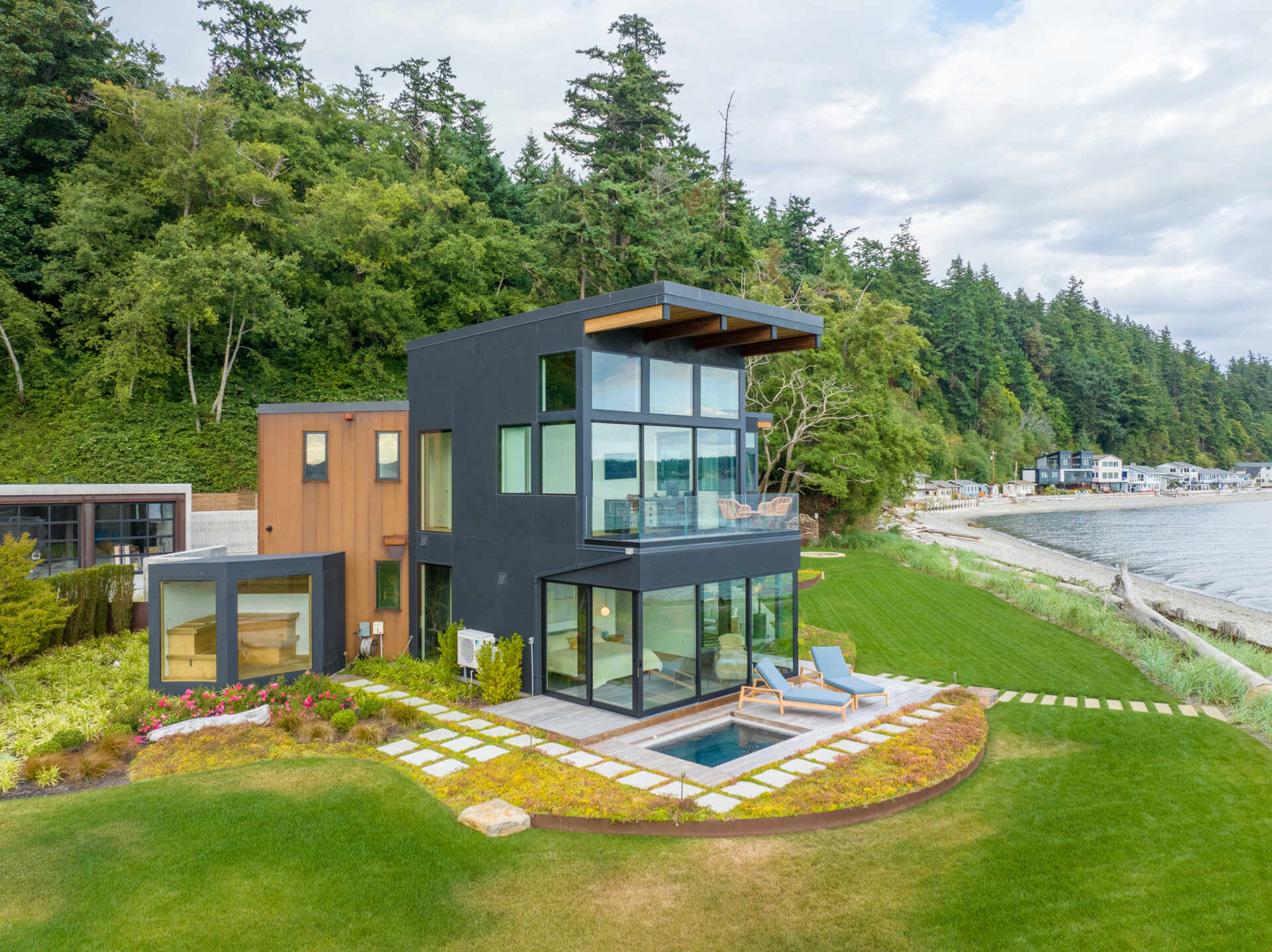 This coastal home shows how architecture can respond directly to land, regulation, and risk. Designed within an existing footprint, the form reflects shoreline rules, steep slopes, and long term durability in a marine environment.