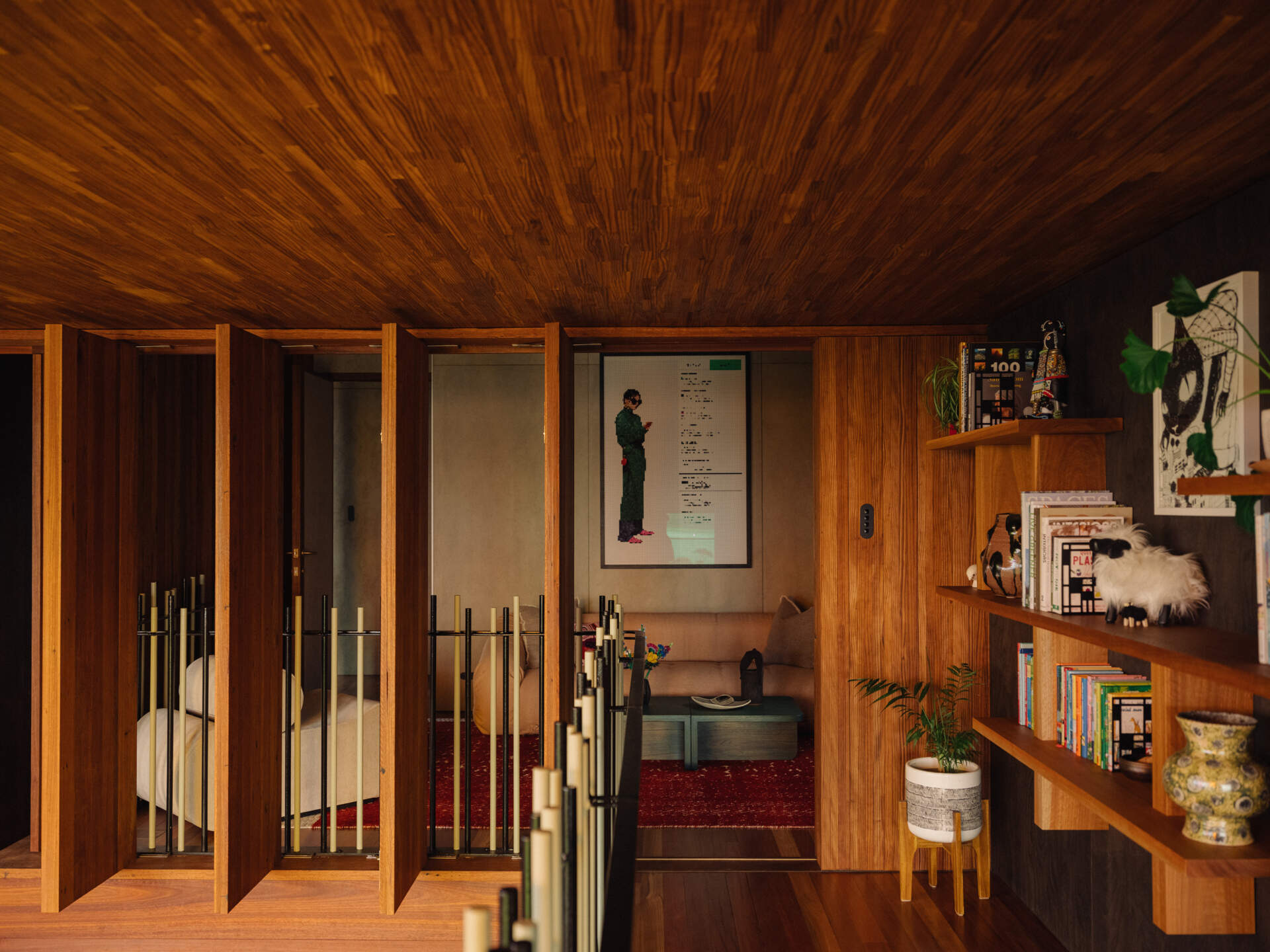 A modern home library provides a place to pause before entering the bedrooms.
