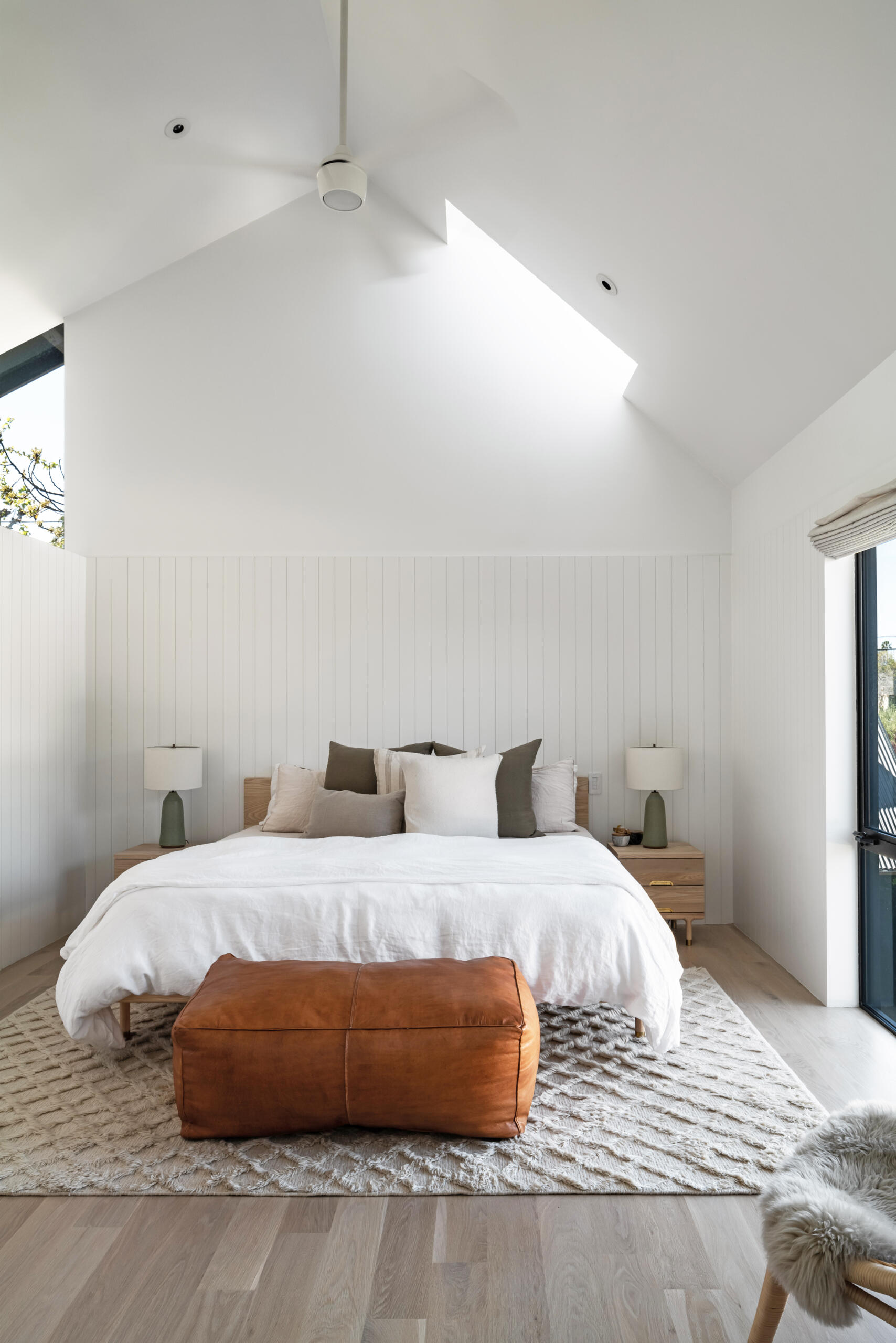 This modern bedroom benefits from the gabled roof structure, gaining volume and spatial interest without unnecessary complexity.