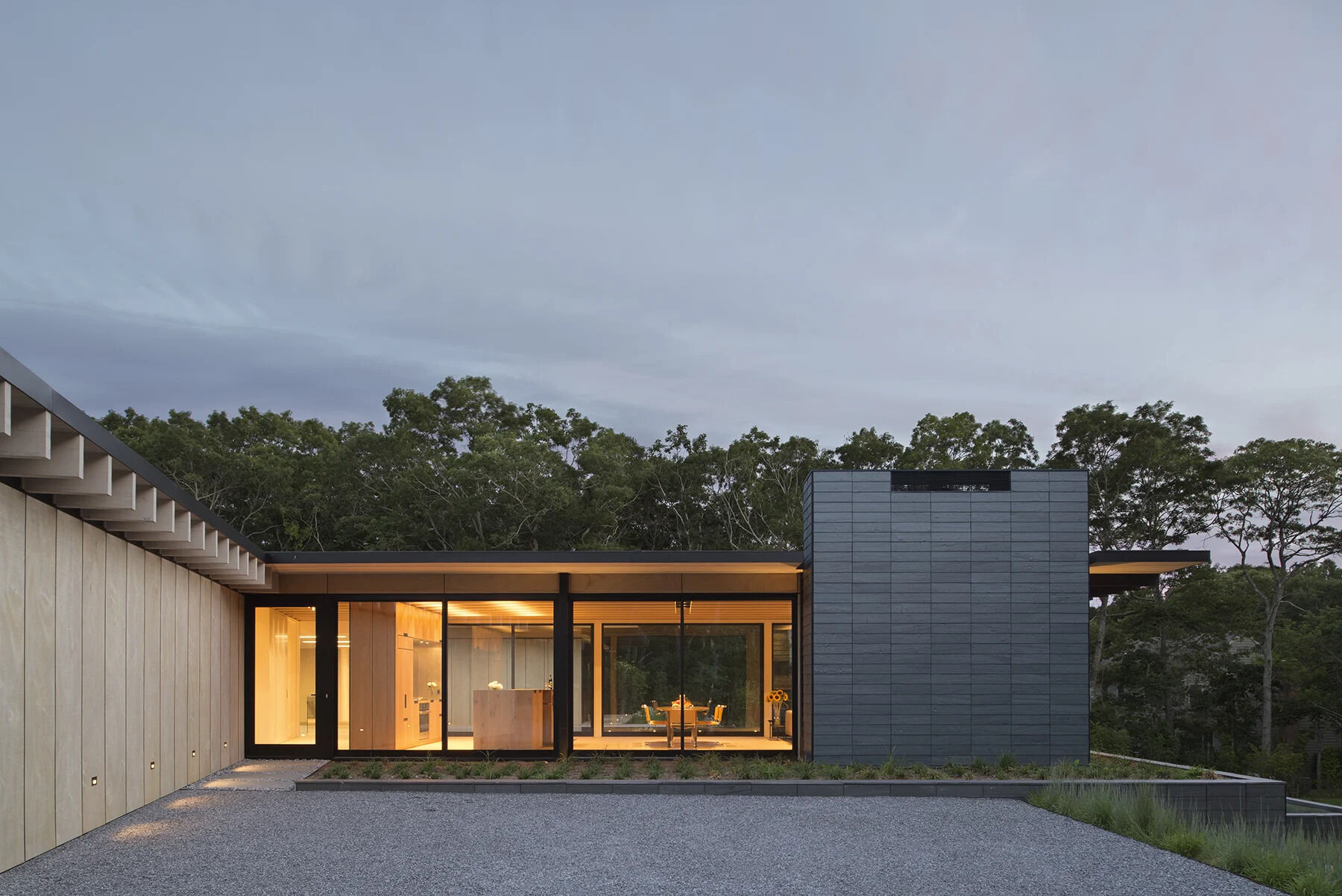 An Amagansett home by Bates Masi + Architects designed around a family’s love of wind surfing, kite boarding, and sailing, where lifestyle directly shapes the architecture.