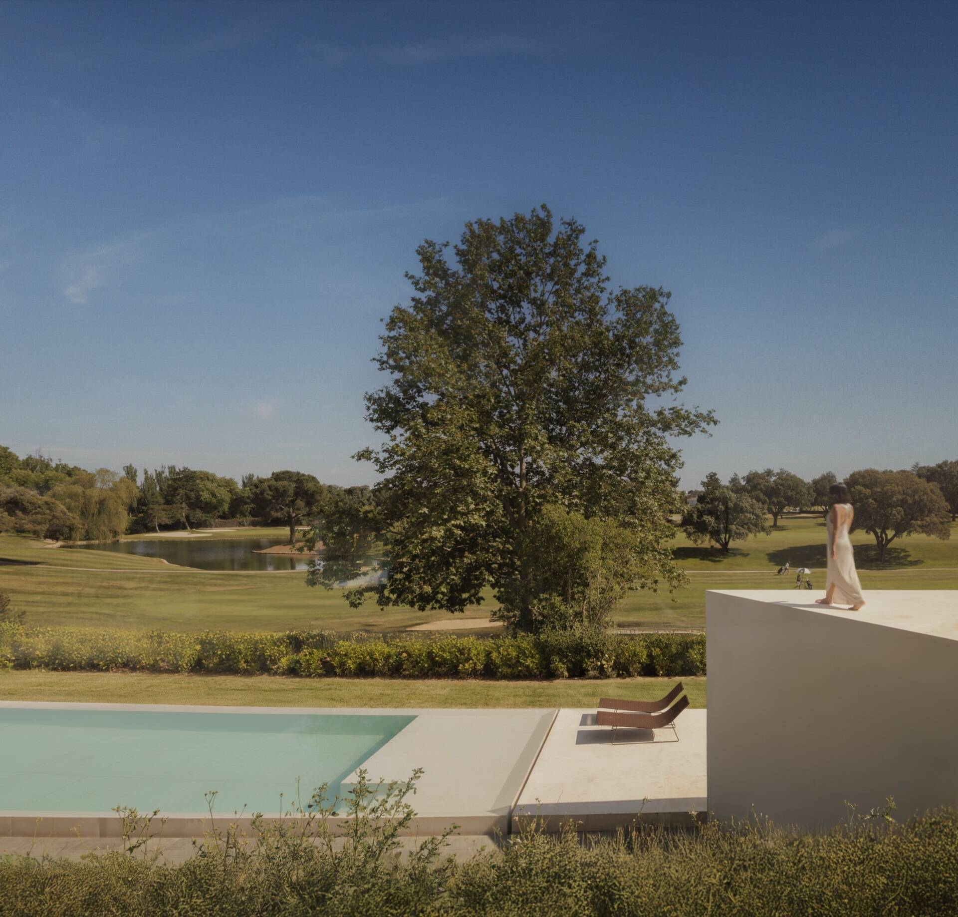 The swimming pool sits on the lowest level of the house, anchoring the start of the ascending architectural layout.