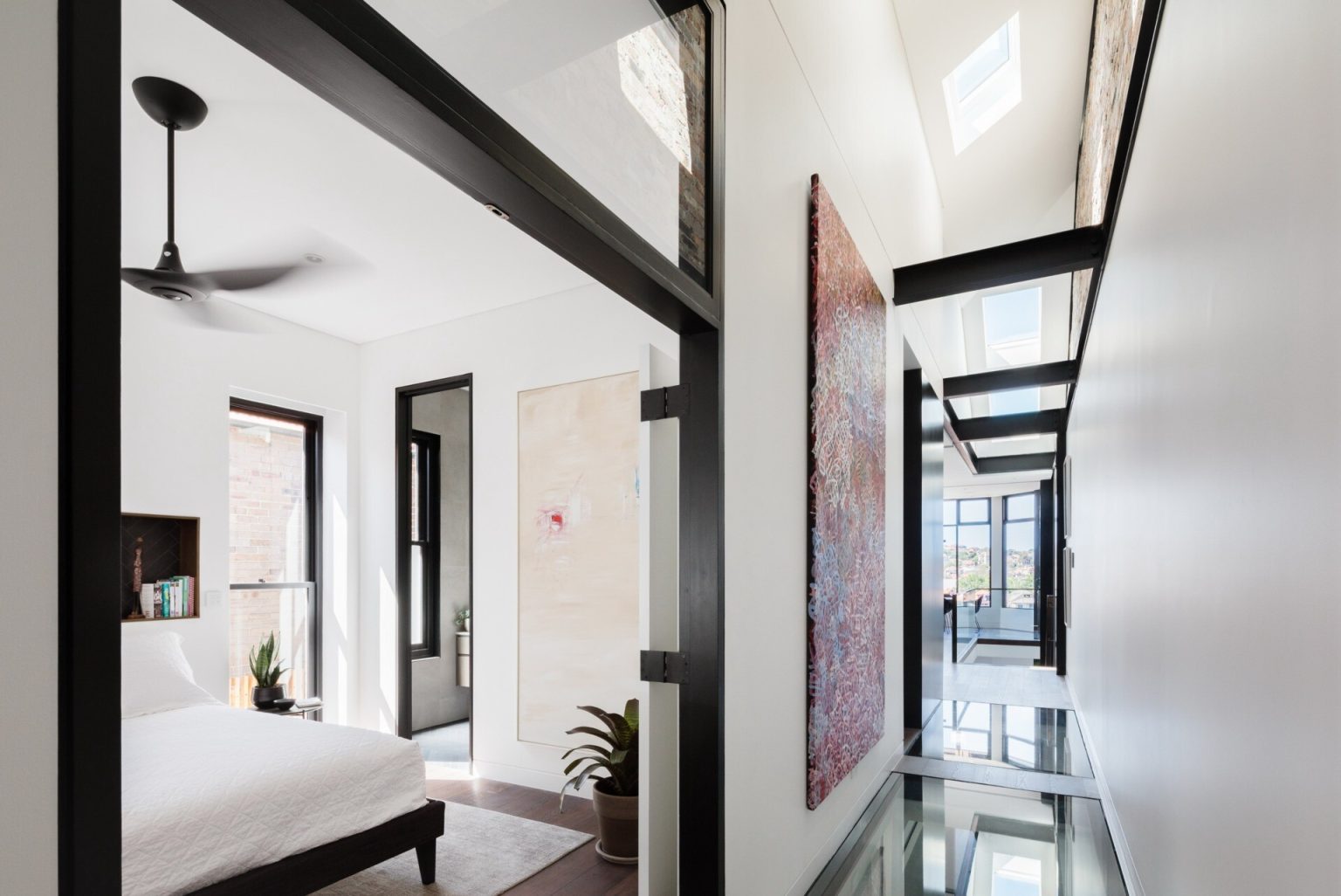 Glass Inside Level Inside a Home Where Glass Floors Let Light Travel Between Levels