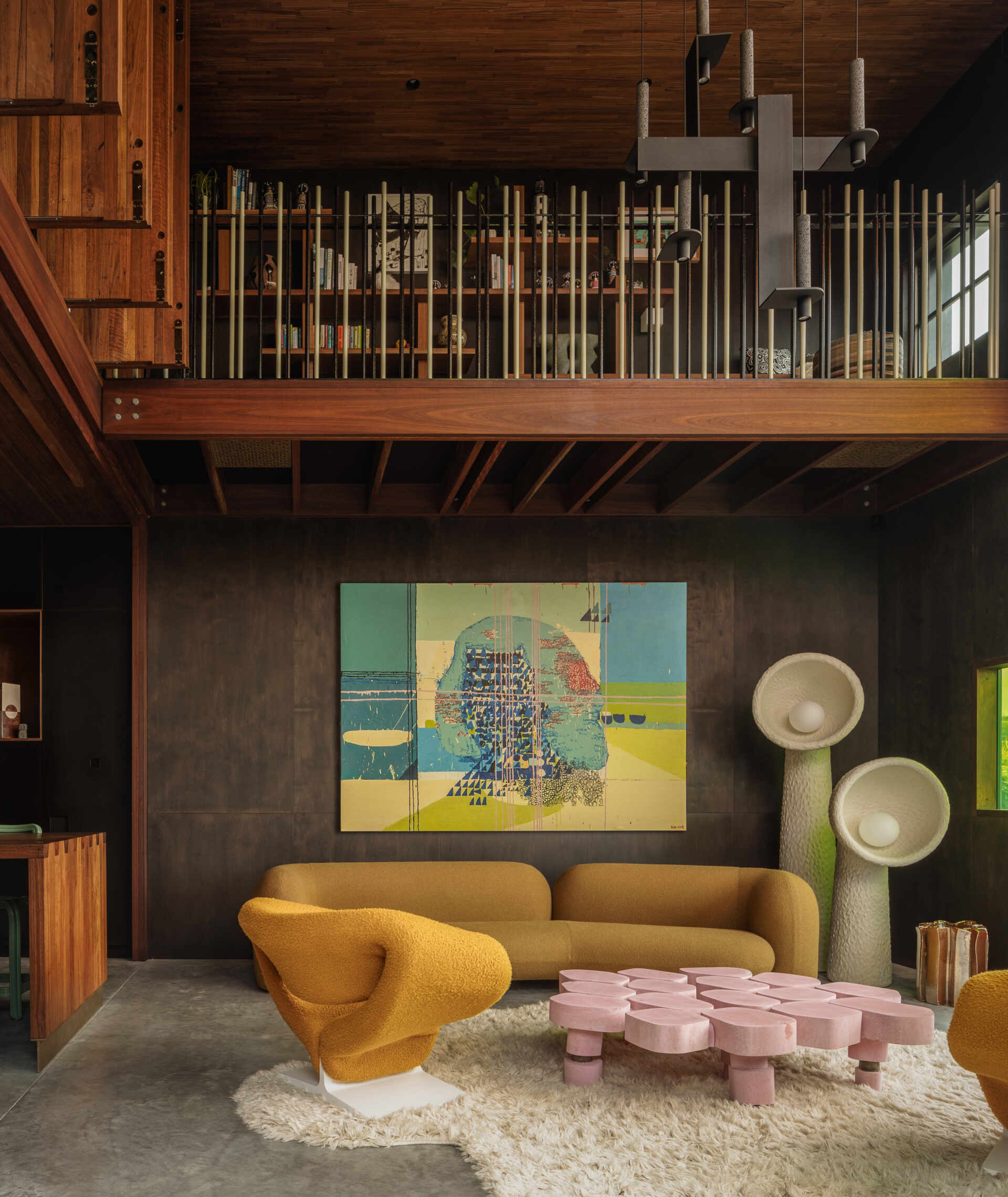 Stained glass panels in the living room fragment coastal views and create moving patterns of light.