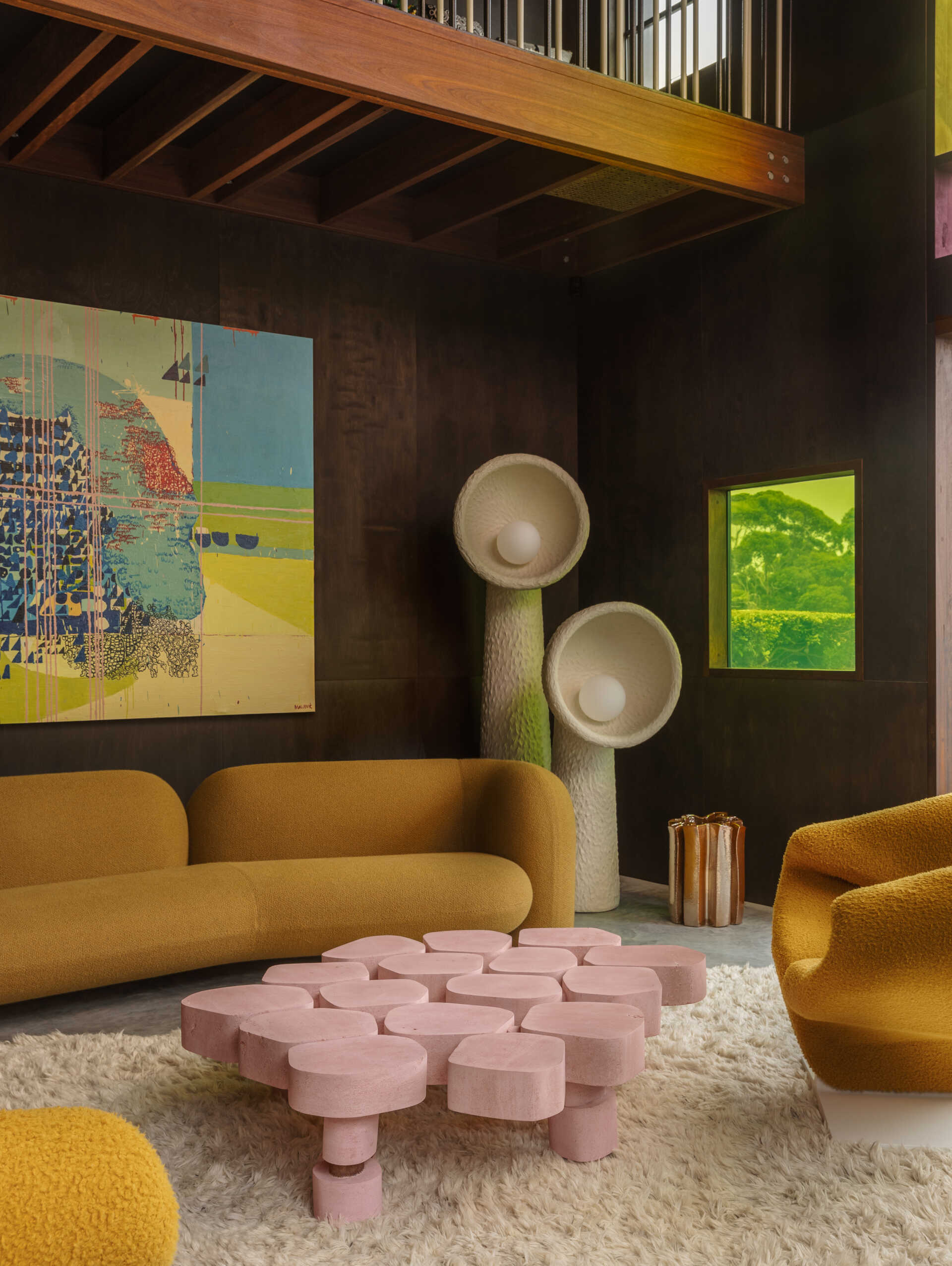 Stained glass panels in the living room fragment coastal views and create moving patterns of light.