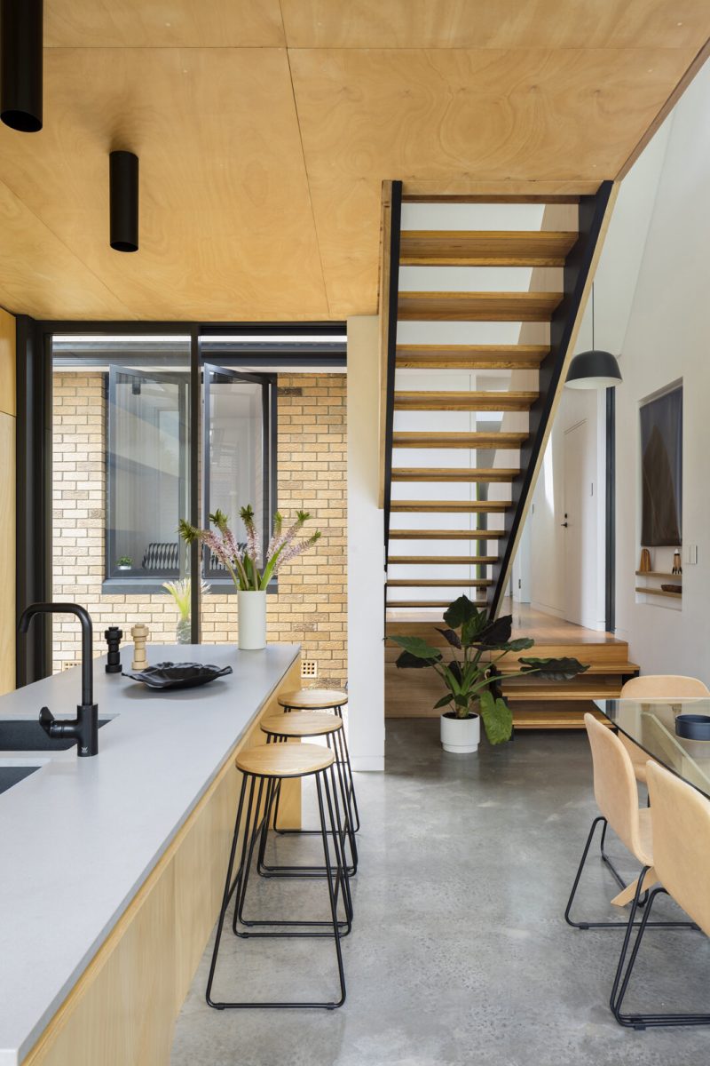 How a Black Metal Extension Turned a 1960s Brick House Into a Light ...