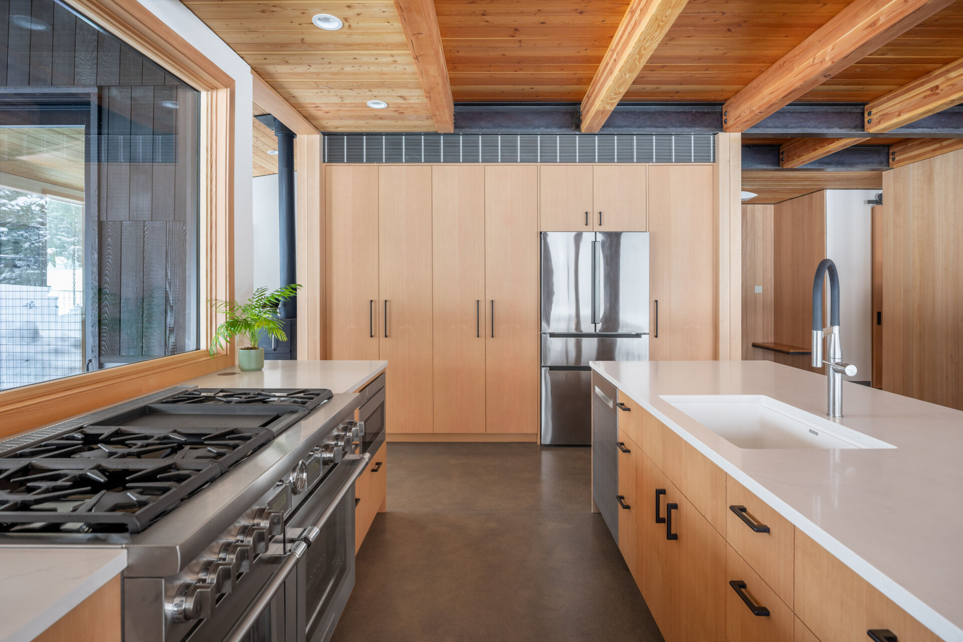 A custom kitchen designed for a former pastry chef, balancing comfort and function while remaining connected to the home’s light-filled living spaces.