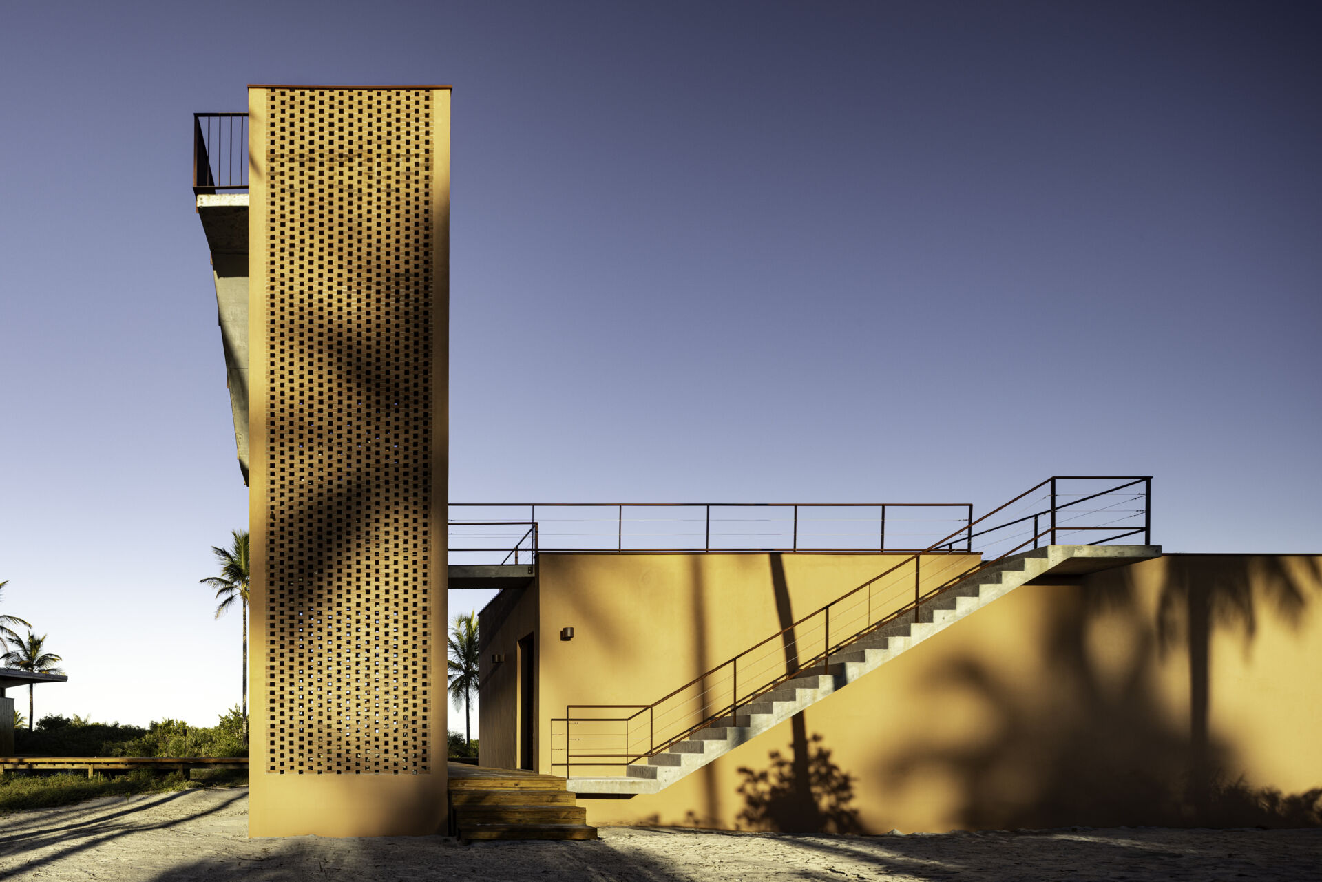 A modular home set between the river and the sea, designed for calm tropical living. Warm wood interiors, large glass openings, and open patios create a seamless flow between forest, coast, and indoor comfort.