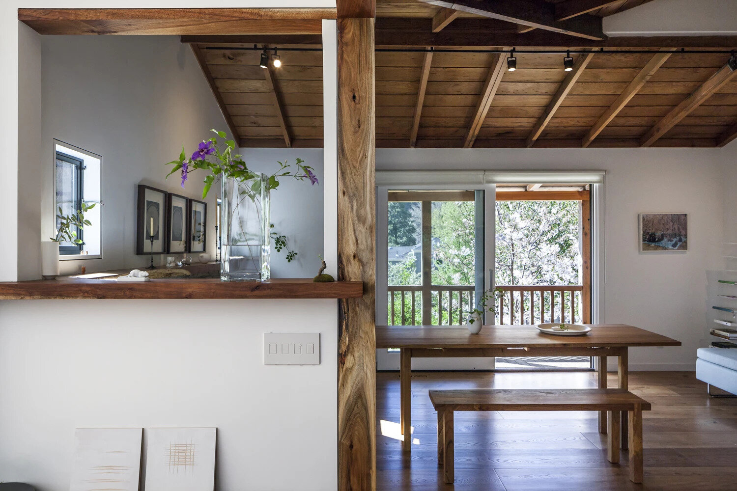 Reclaimed woods and exposed Douglas Fir ceilings create warm, natural interiors that highlight mountain views.