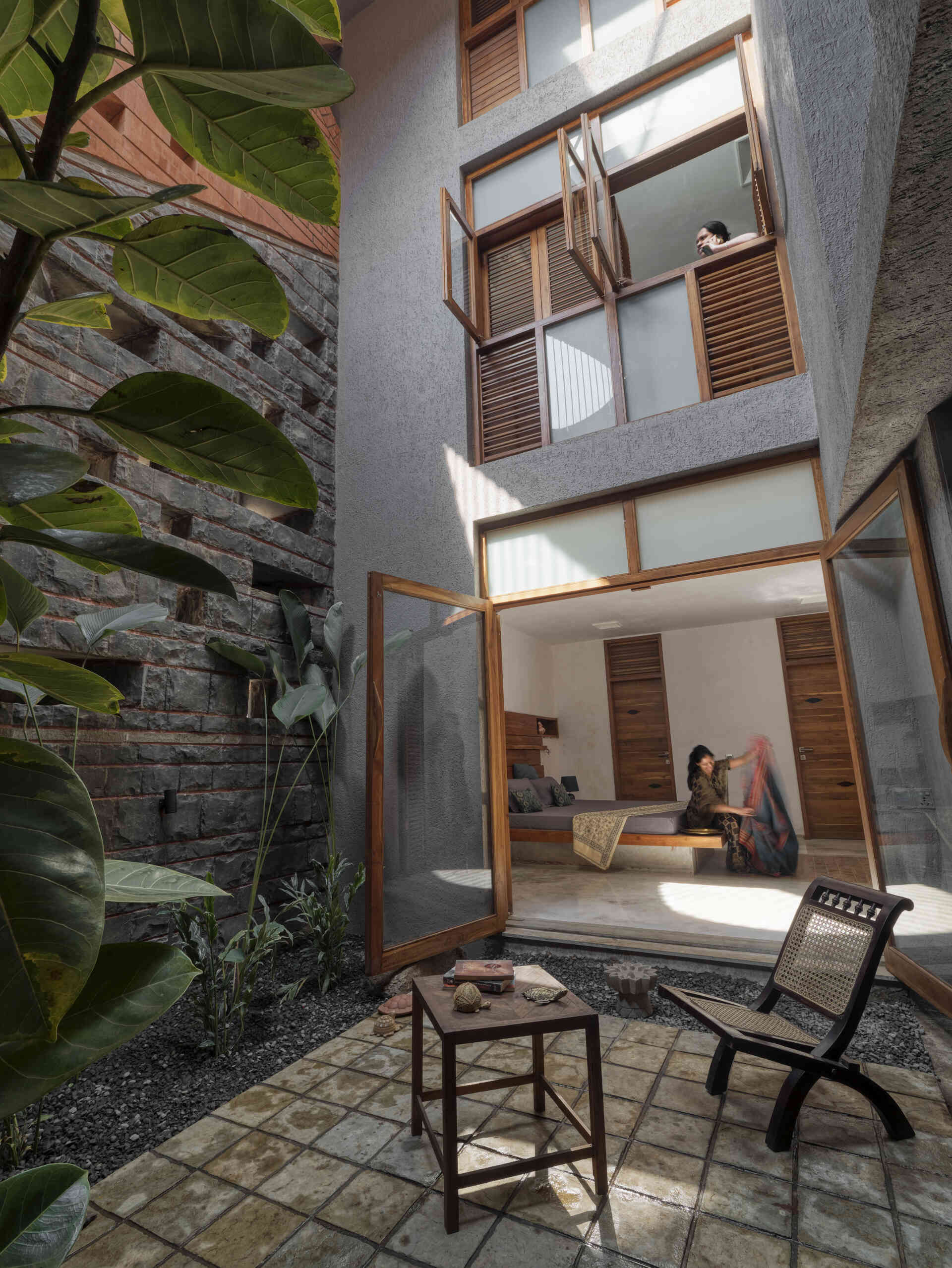 See the curved brick cutouts that act as both ornament and performance features, shaping airflow, shade, and character throughout the home.