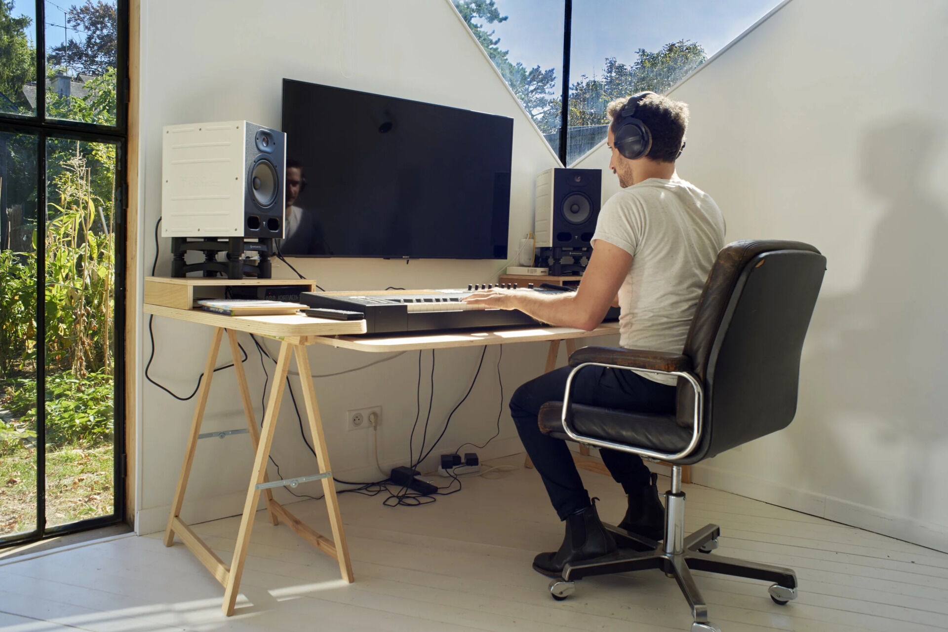 A compact backyard studio designed by JCPCDR Architecture for a composer seeking a quiet workspace in the countryside.