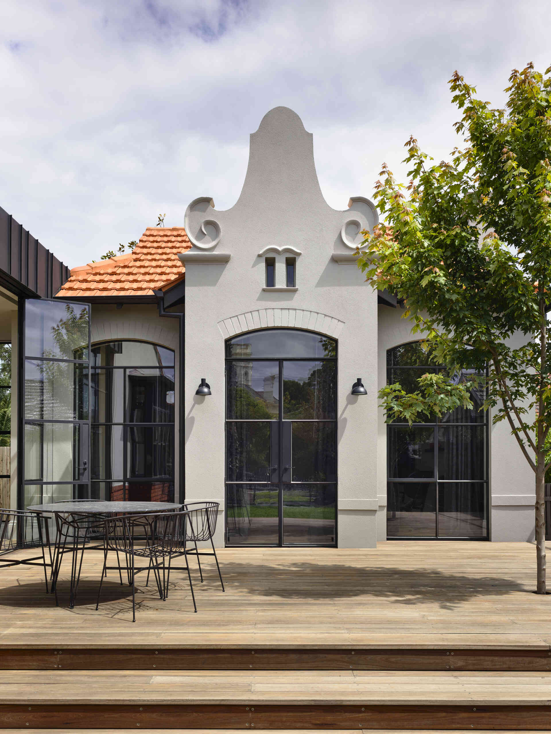 A historic Dutch Gable home entry that sets the tone for a bold contemporary interior. Classic detailing meets a confident modern design direction from the first step inside.