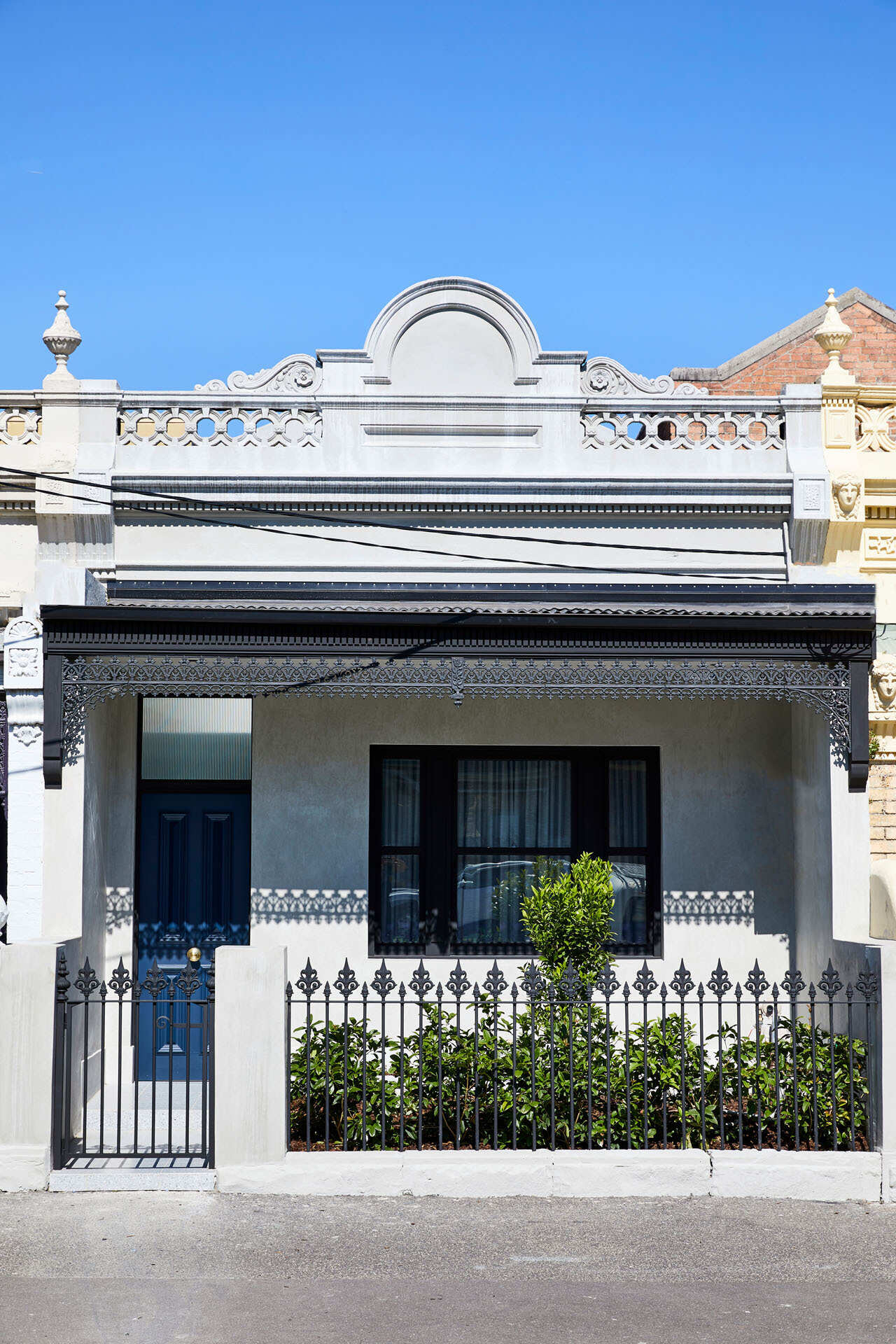 A Victorian-era home is renovated with a modern extension and a hidden indoor garden that brings light, greenery and connection into the centre of family life.