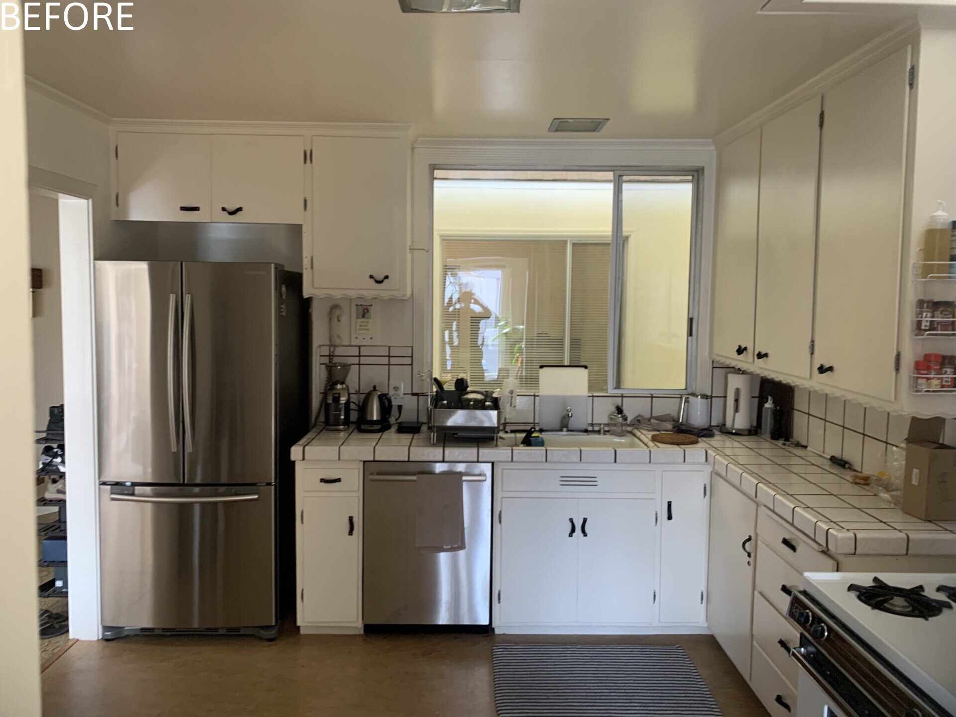 Before, the kitchen was part of the home’s dark and divided interior, lacking a strong relationship to the rest of the living spaces. After the renovation, the kitchen becomes a focal point. A walnut clad island folds geometrically upon itself, inspired by the home’s original 45 degree angled walls.