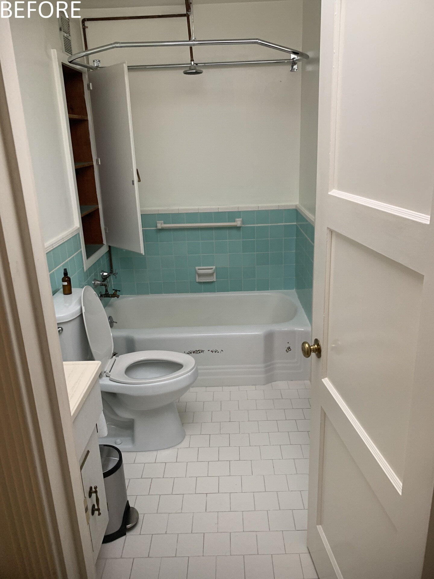 Like many older homes, the bathrooms were previously dark and enclosed. Natural light was minimal. The reconfigured main bathroom introduces a dramatic skylight directly over the shower. Dark gray tiles, slate flooring, and walnut cabinetry create contrast beneath the daylight above.