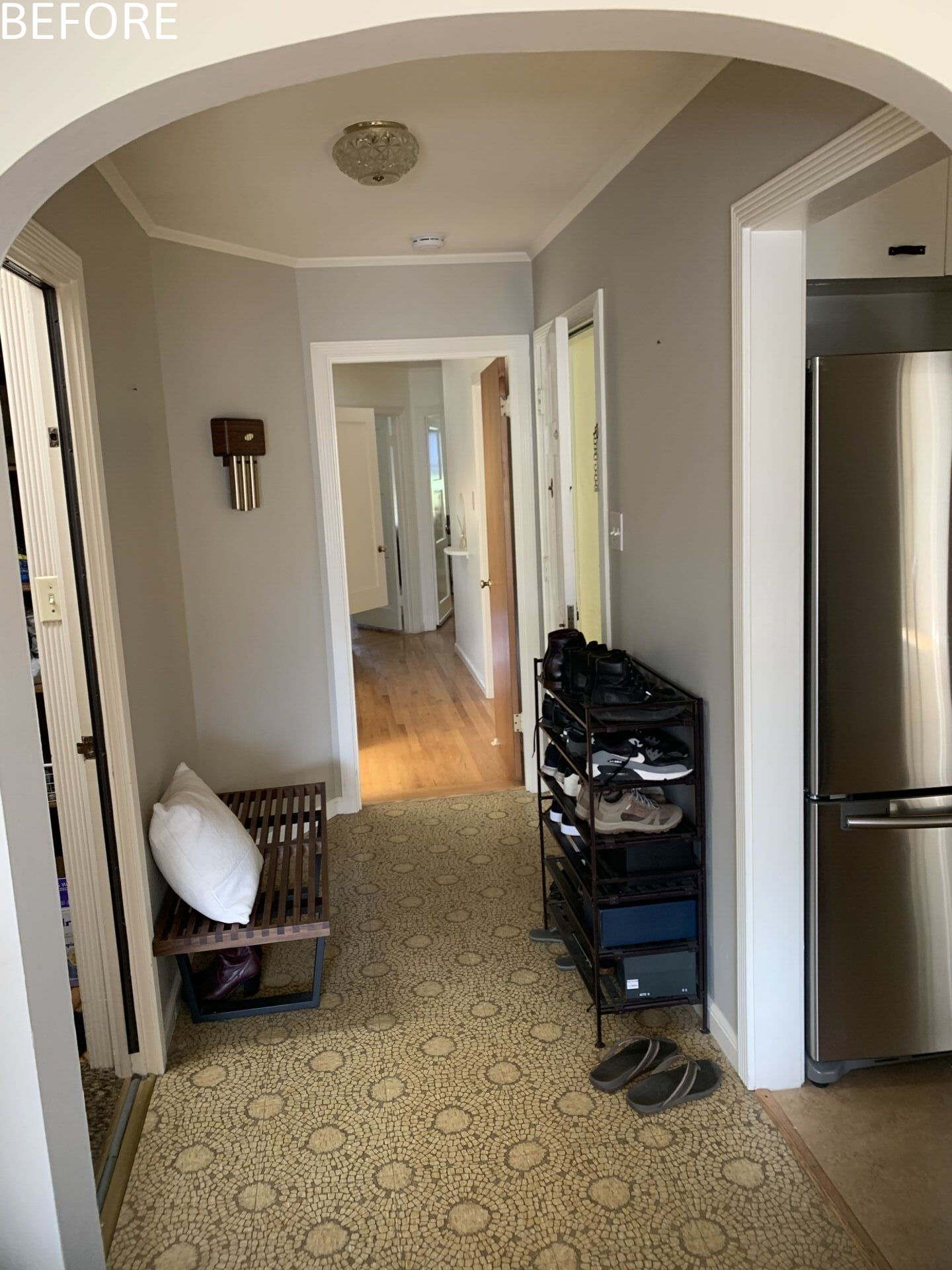 The original circulation did little to enhance light or connection between floors. Movement through the home felt secondary to the closed rooms it served.

The new central staircase transforms circulation into an architectural feature. A single piece glass guard maintains visual openness, while a sculptural metal handrail appears to float. Positioned beneath the skylight, the stair preserves sightlines and strengthens the sense of vertical continuity.