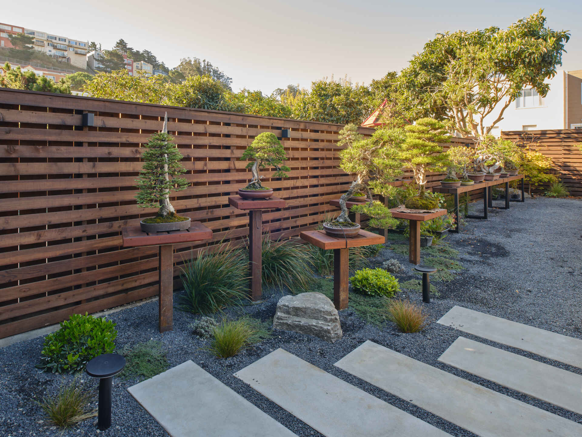 A renovated home with a bonsai workshop and garden.