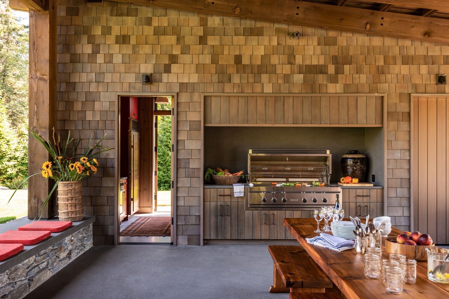 The eastern wing houses a built in barbecue, full kitchen essentials and two bathrooms, making the fieldhouse ready for celebrations, sports days and long summer evenings.